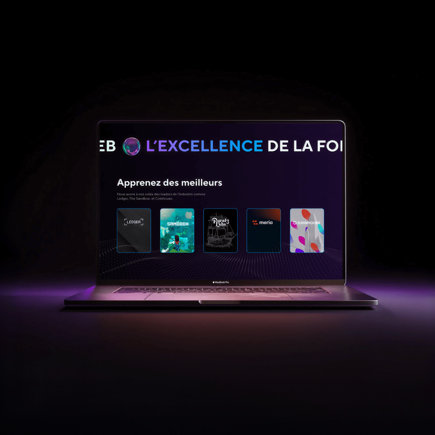 Blockchain Business School website displayed on a laptop.