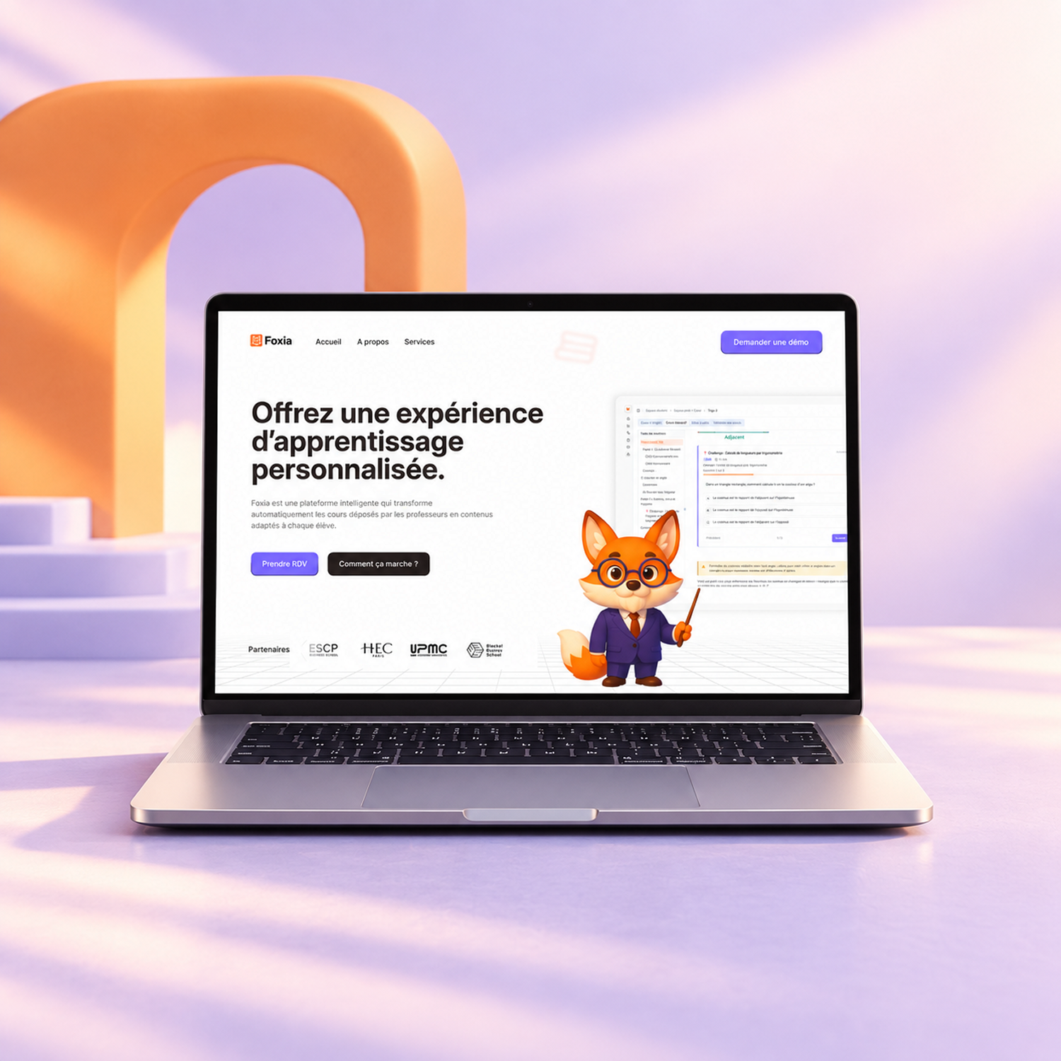Foxia learning website displayed on a laptop with orange accents.