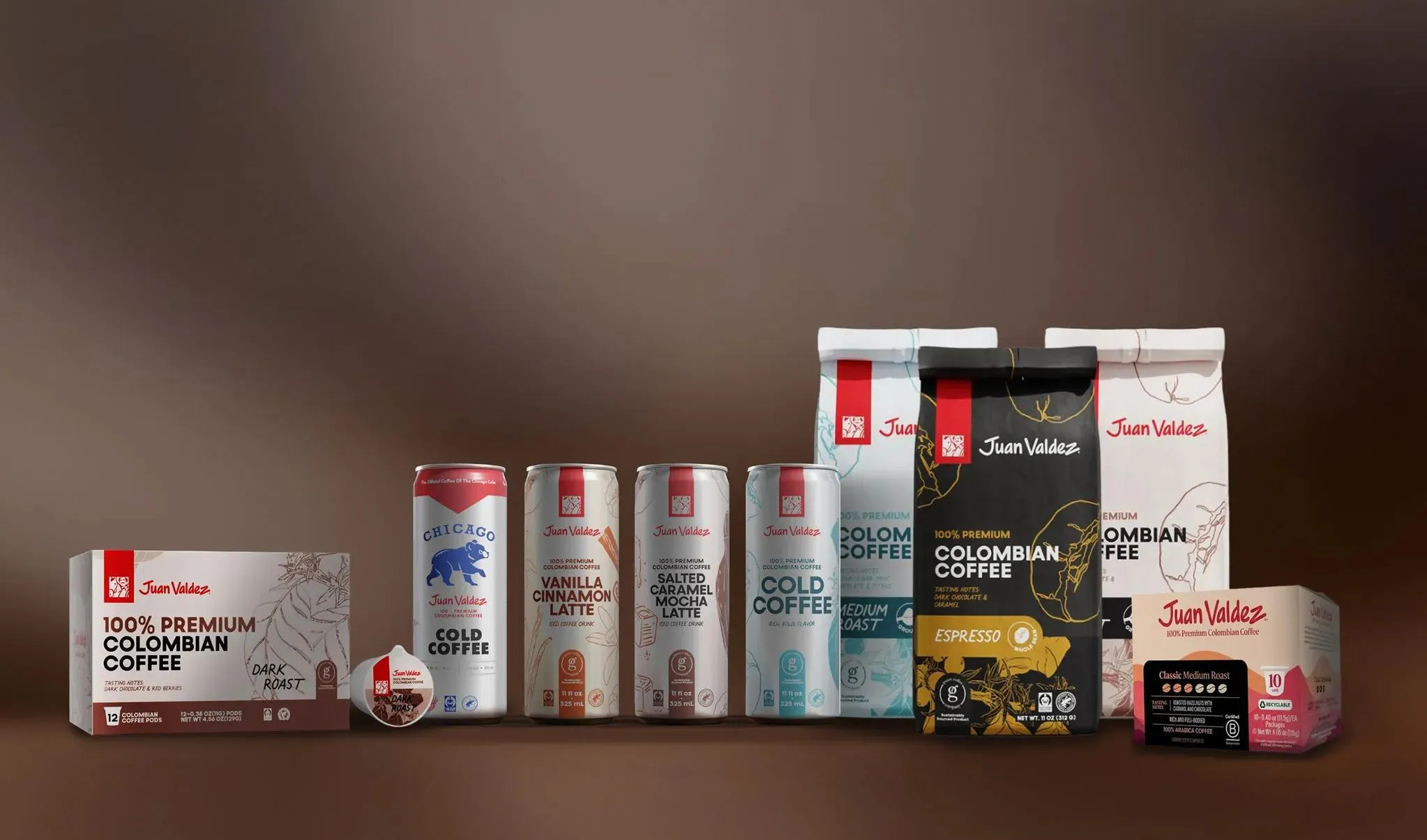 Juan Valdez product lineup: coffee pods, canned cold coffee and lattes, and bags of Colombian coffee.