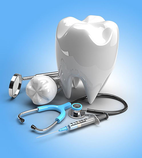 Large white tooth model with a stethoscope, dental mirror, tooth model, and syringe on a blue background.