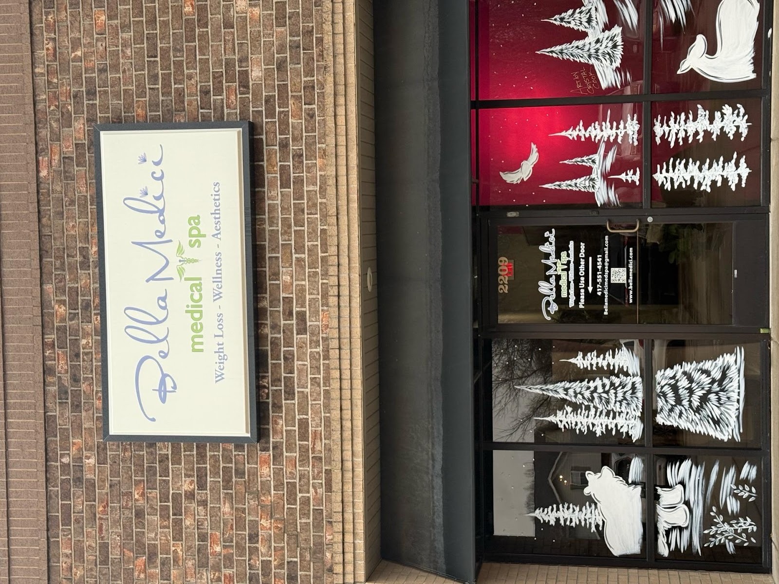 A sign on a brick wallAI-generated content may be incorrect.