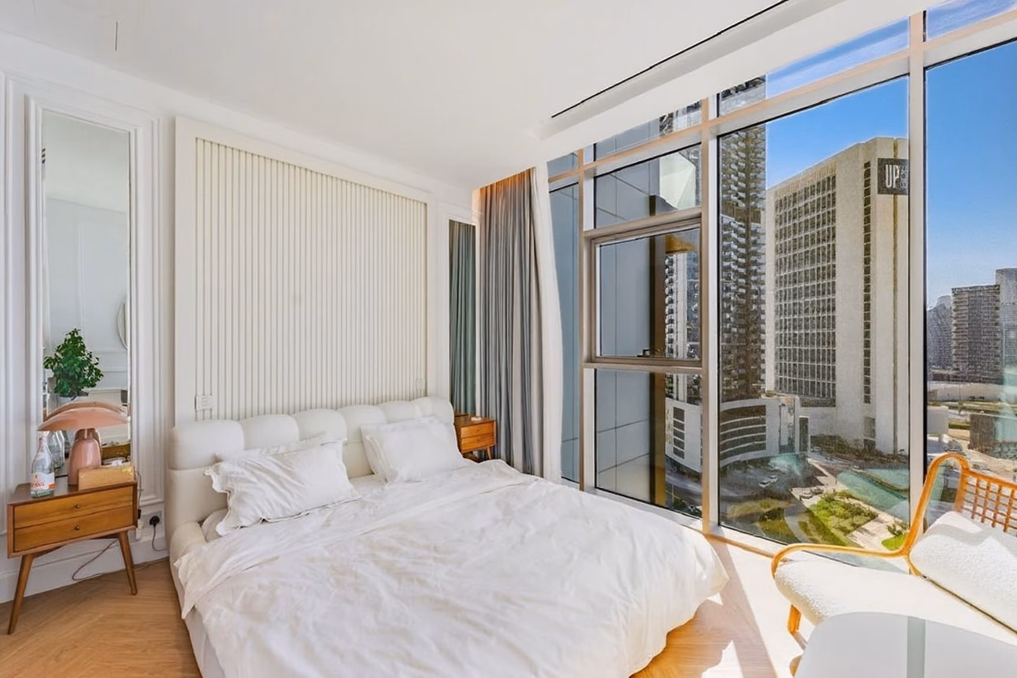 Wake up above the city in a space designed to calm, inspire, and impress