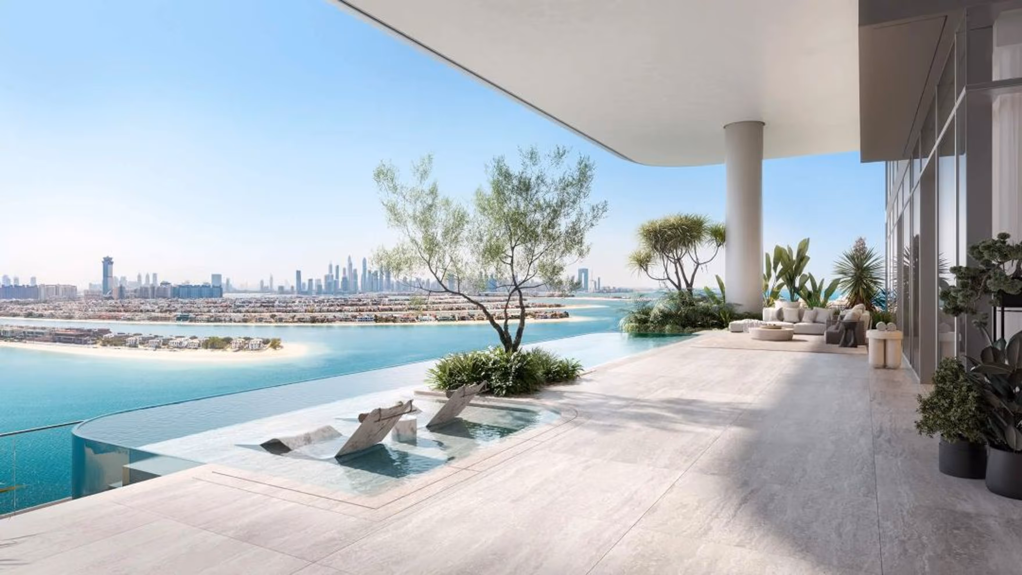 Expansive interiors flow seamlessly to terraces, framing the sea as a living backdrop.