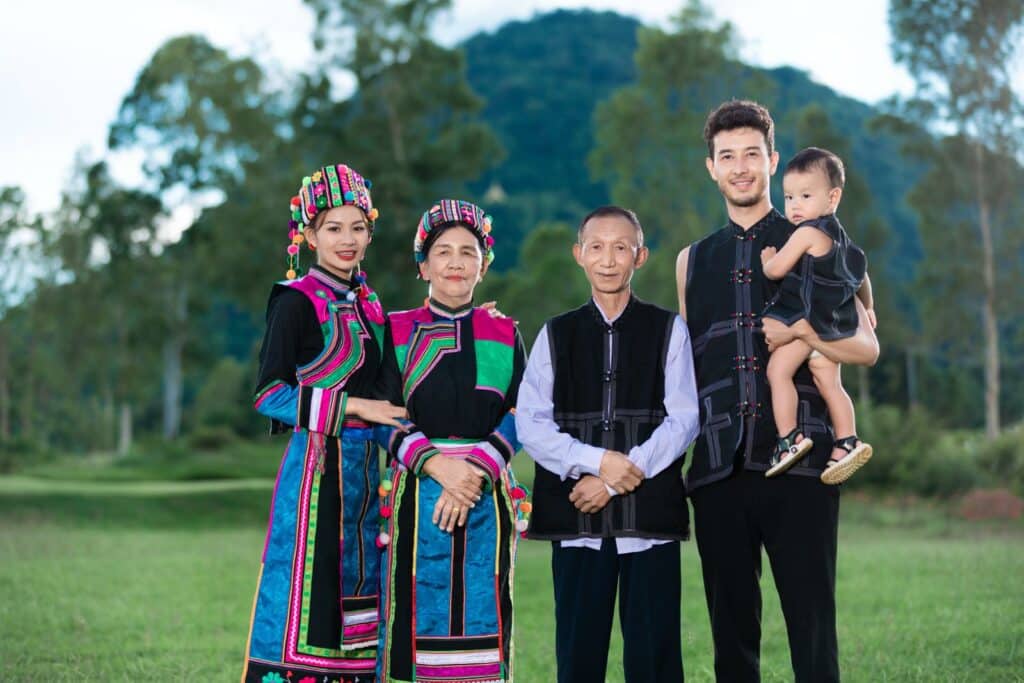 Family posing in traditional Lisu clothing.
