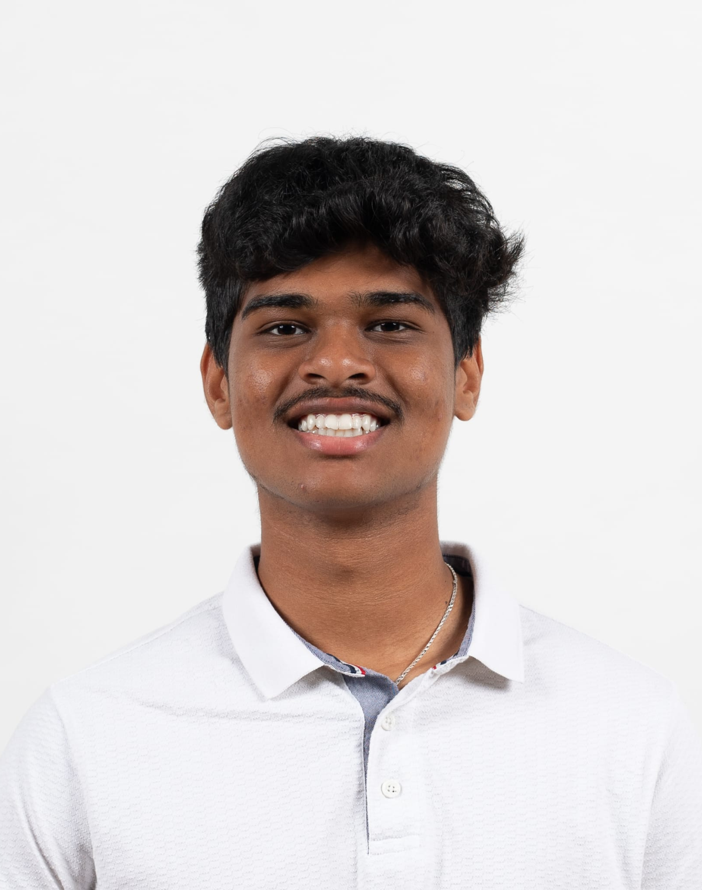 Summer Nitsch - smiling woman with long blonde hair wearing a royal blue dress and a gold necklace.