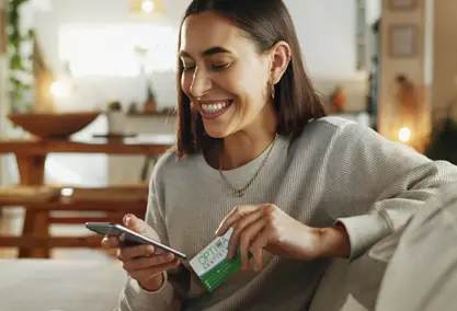 Lady happy to contact Optima Dentistry