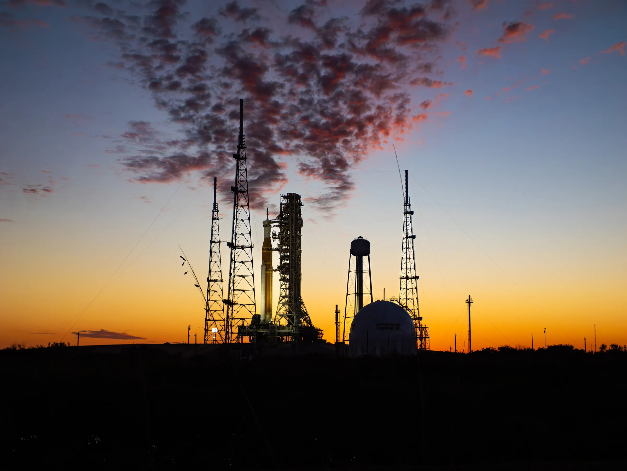 NASA's Artemis II rocket on Launch Pad 39B at sunset