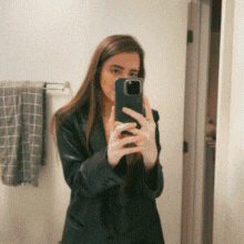 Gif of personal moments from Jess' life, including a mirror selfie, flowers, flowers, her grey cat Ketchup, and the Pacific ocean from above.