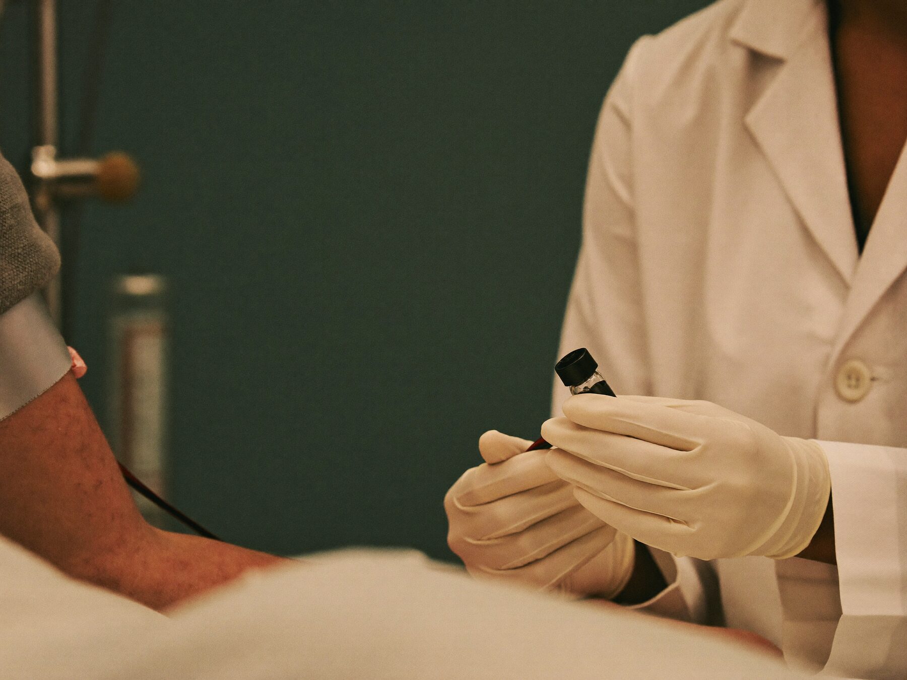 Clinician performing a calm blood draw for AlyneMD lab testing
