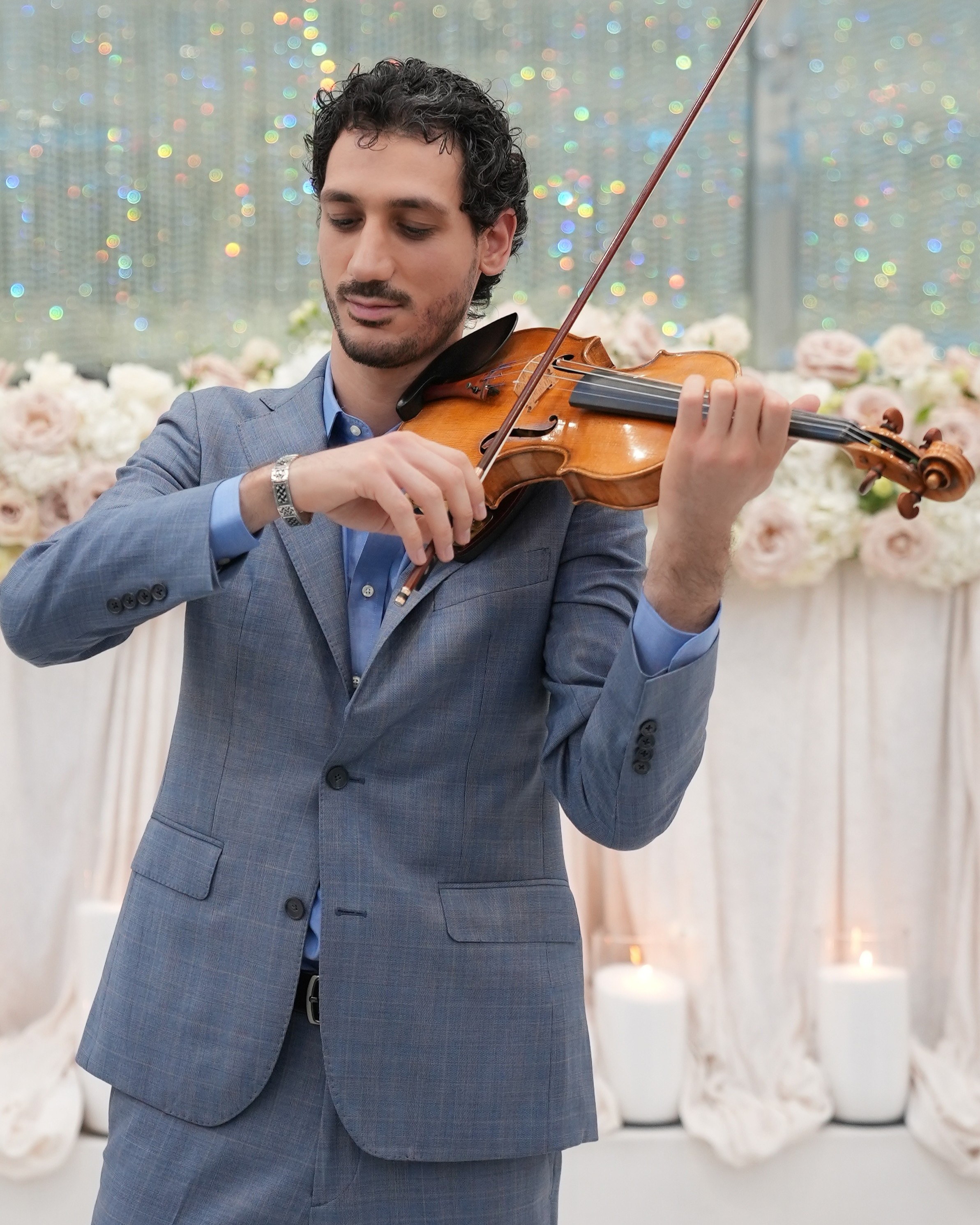 Nick Kelian performing violin — Listen