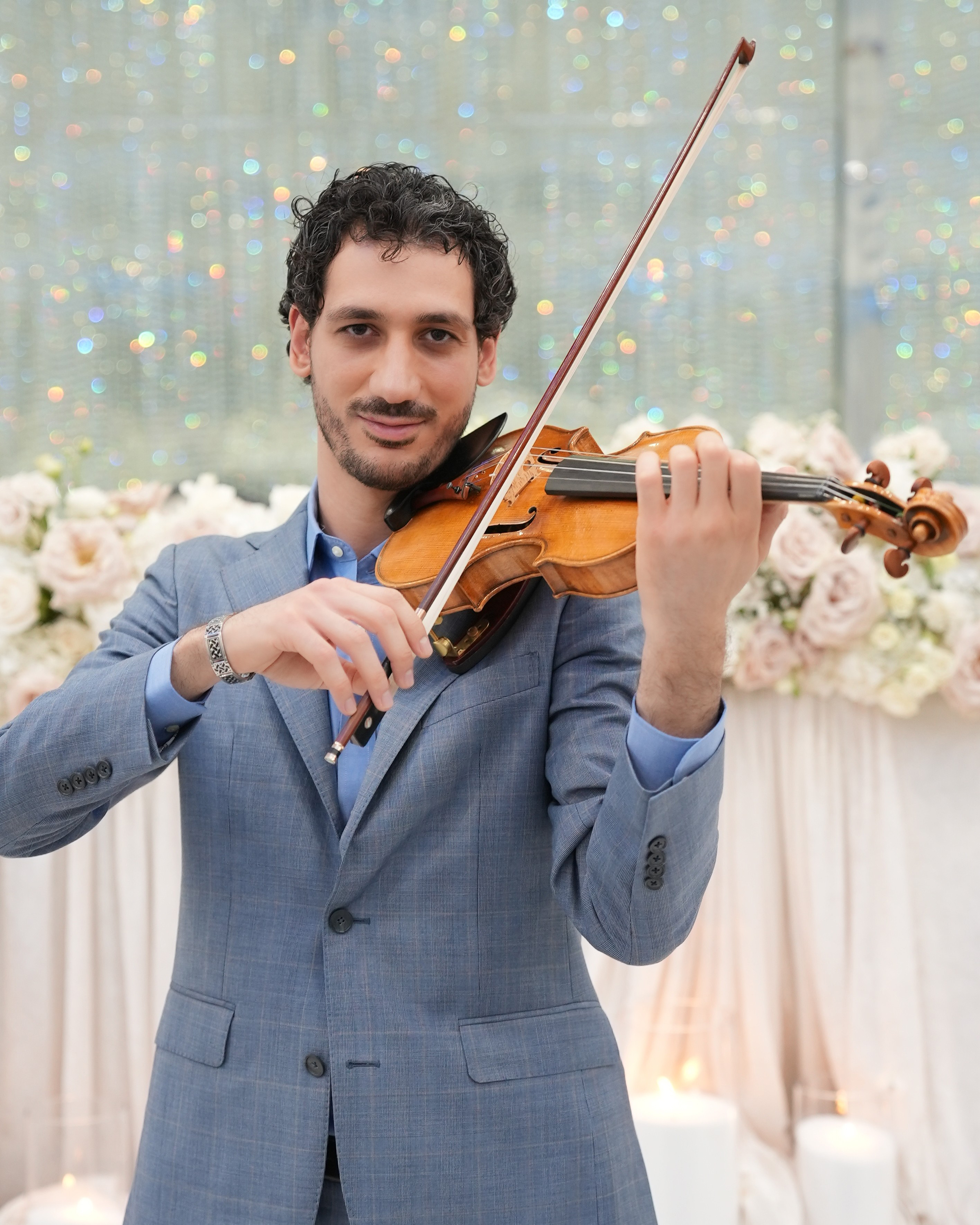 Nick Kelian performing violin — Perform
