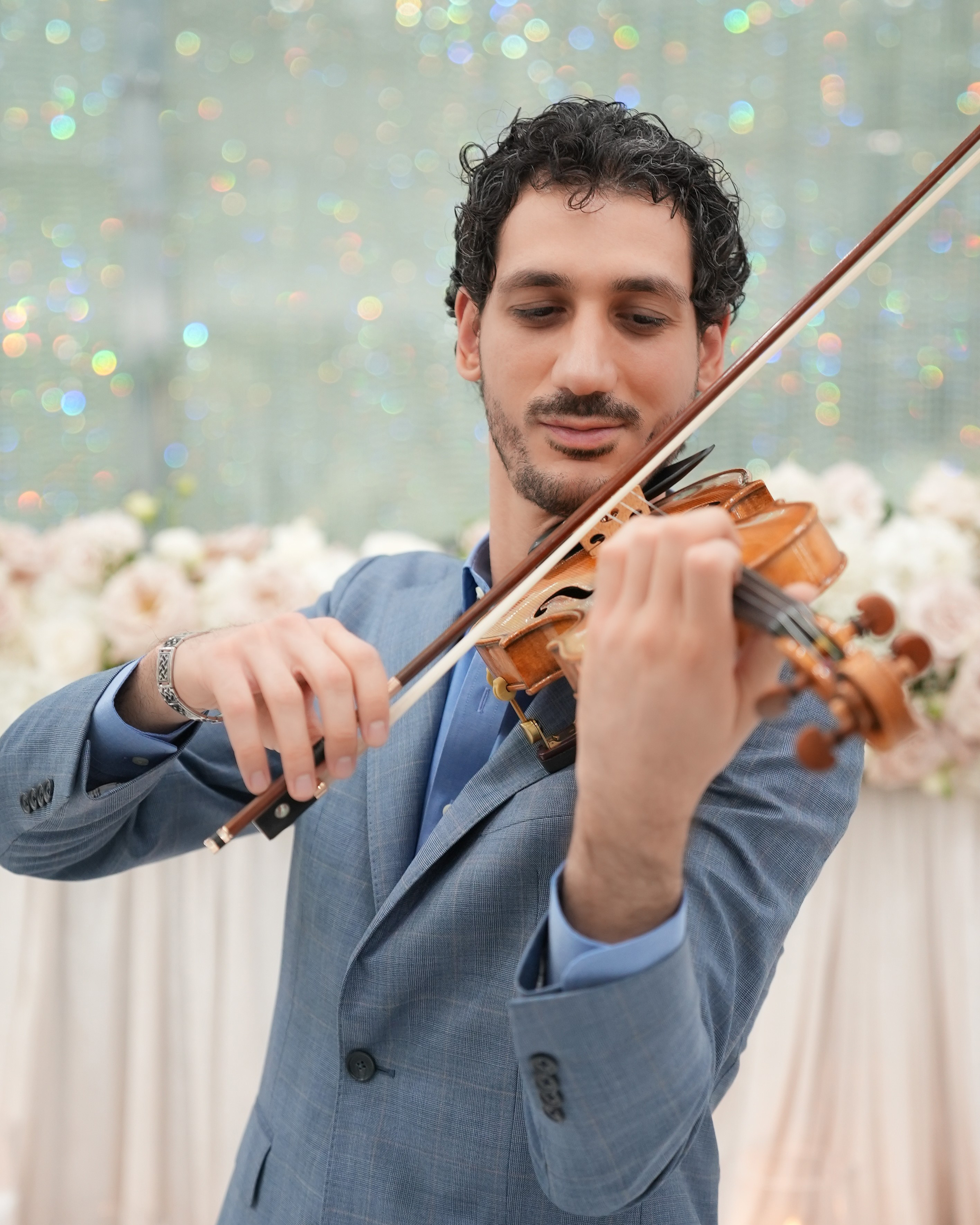 Nick Kelian performing violin — Shape