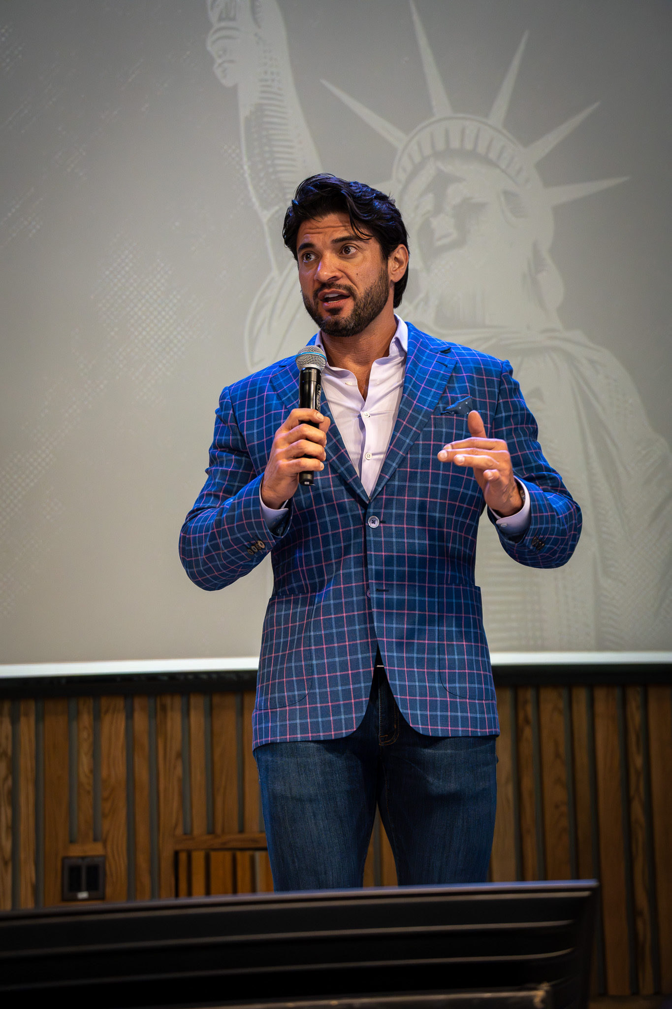 A speaker presents on the Growth Accelerator stage