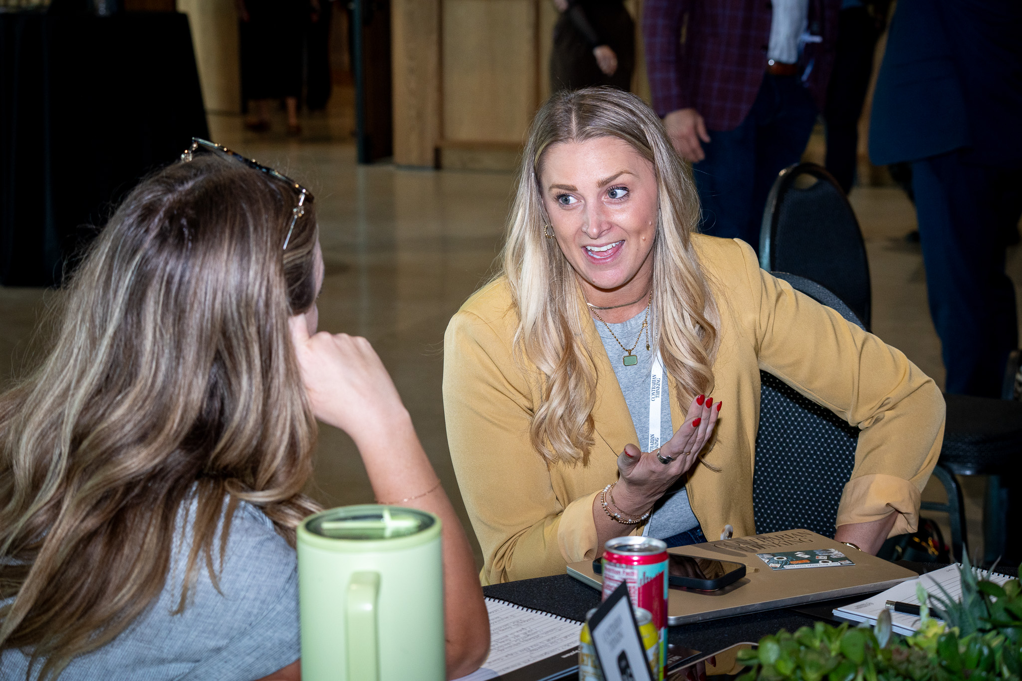 Two owners work through a plan together at their table