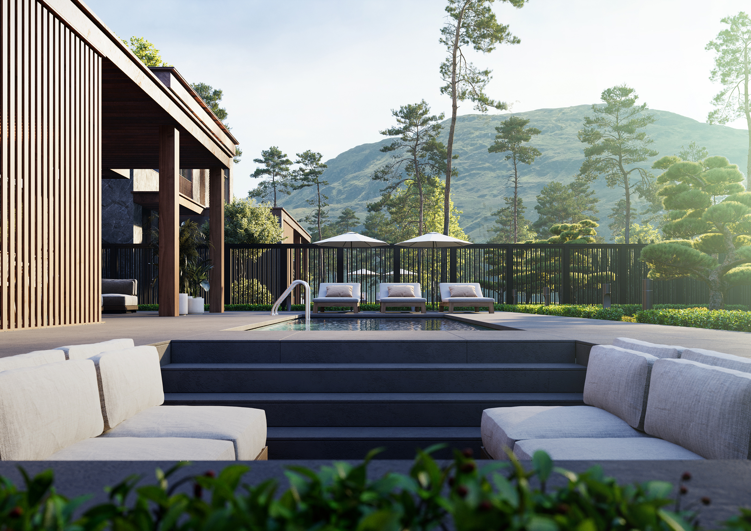 MacBook on the dark stone.