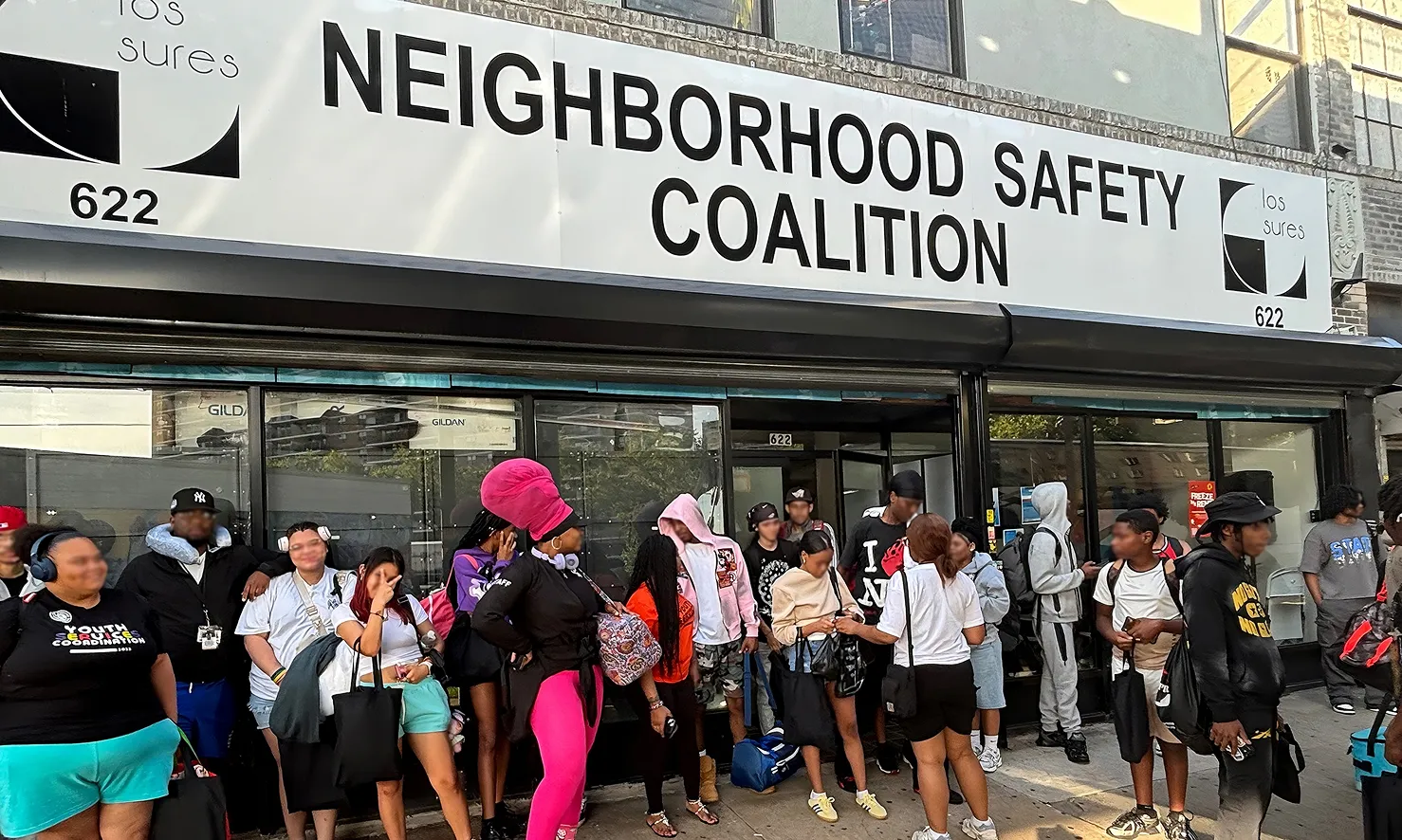 Neighborhood Safety Coalition members gathering in front of their community center in Lower East Side, New York City
