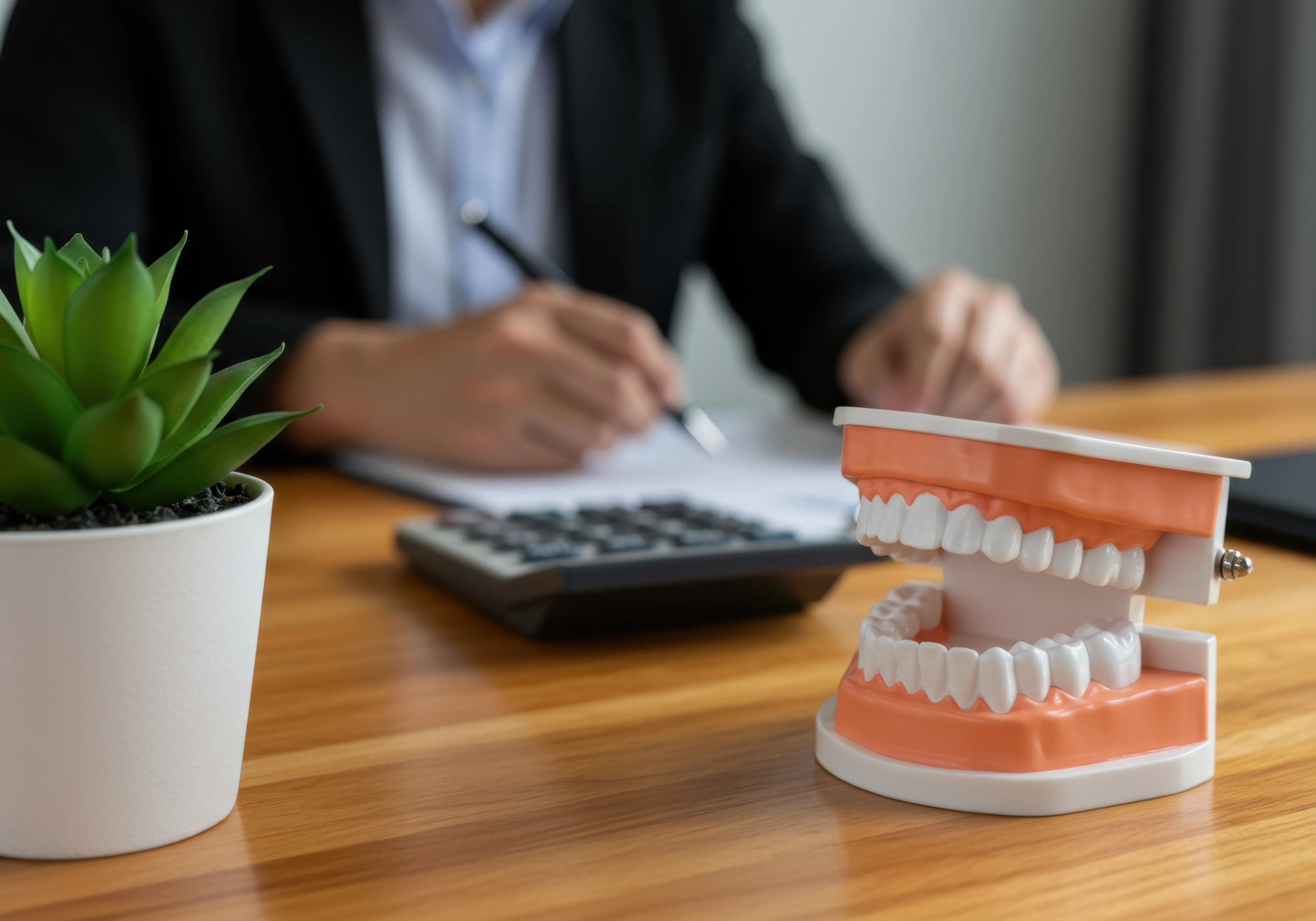 Patient discussing dental insurance and financing options at Legacy Dental Pasadena