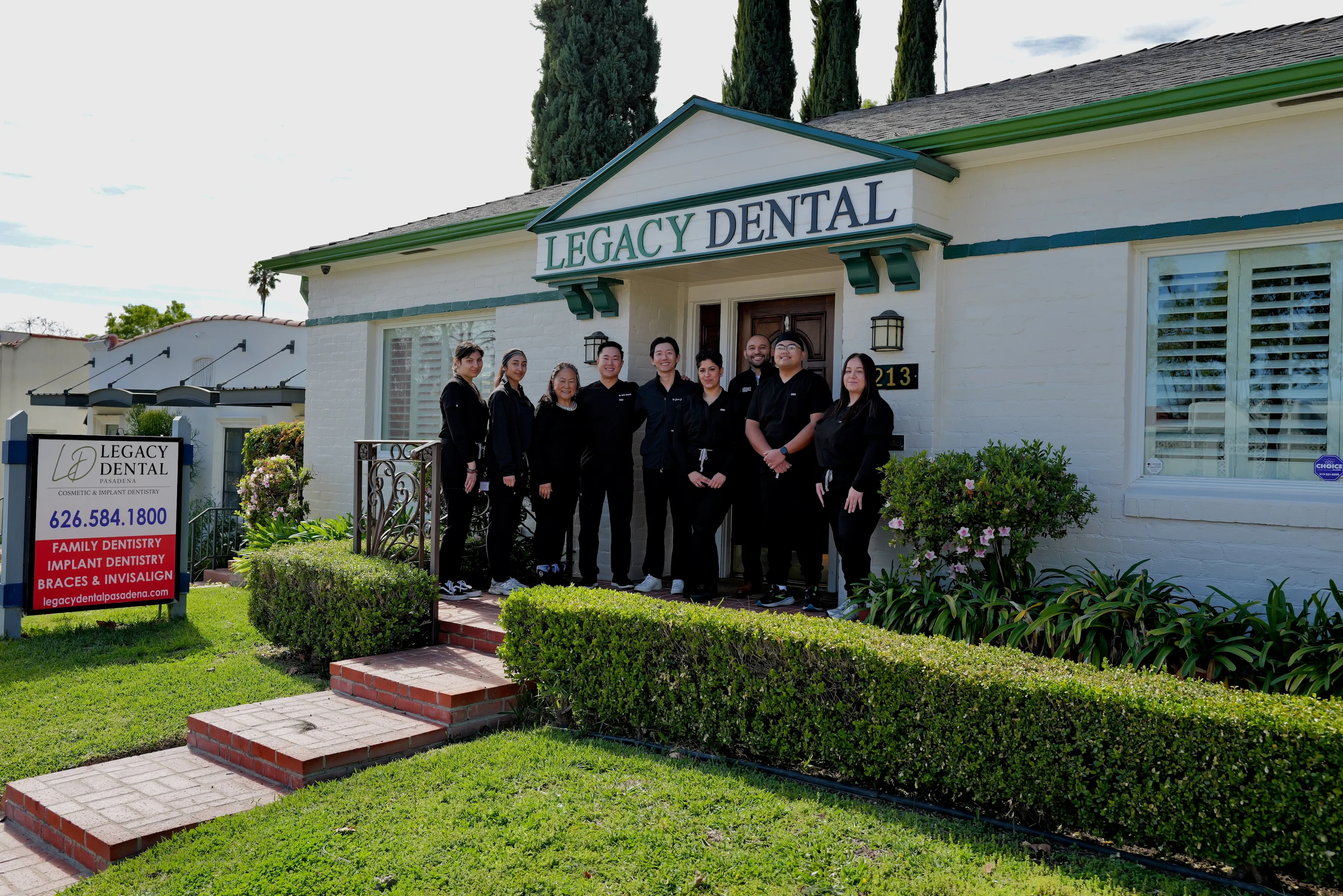 Dr. Sean Sunyoto and Legacy Dental Pasadena dental team outside their Pasadena, CA office specializing in family dentistry, dental implants, and Invisalign