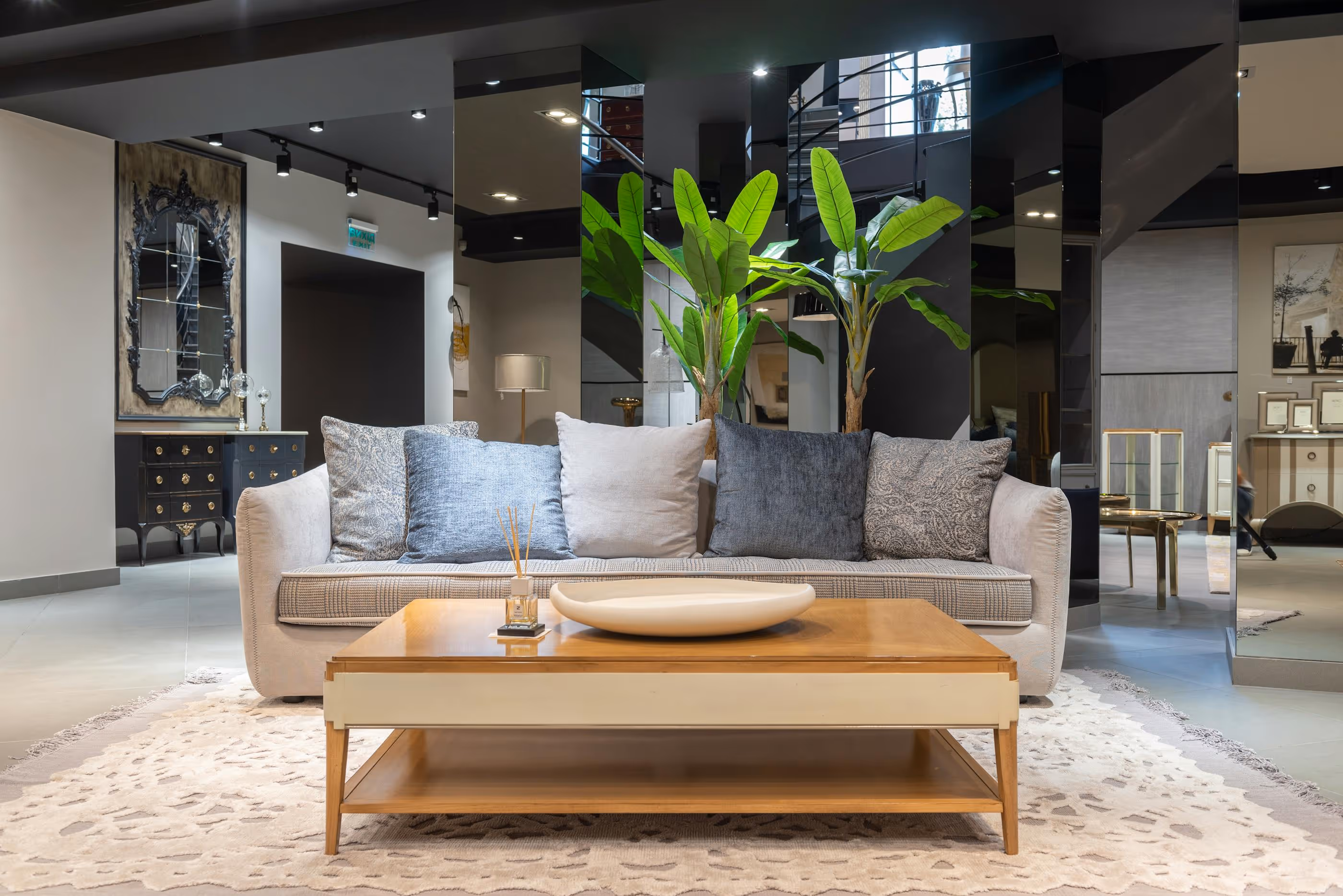 Neutral sofa with cushions and wooden coffee table