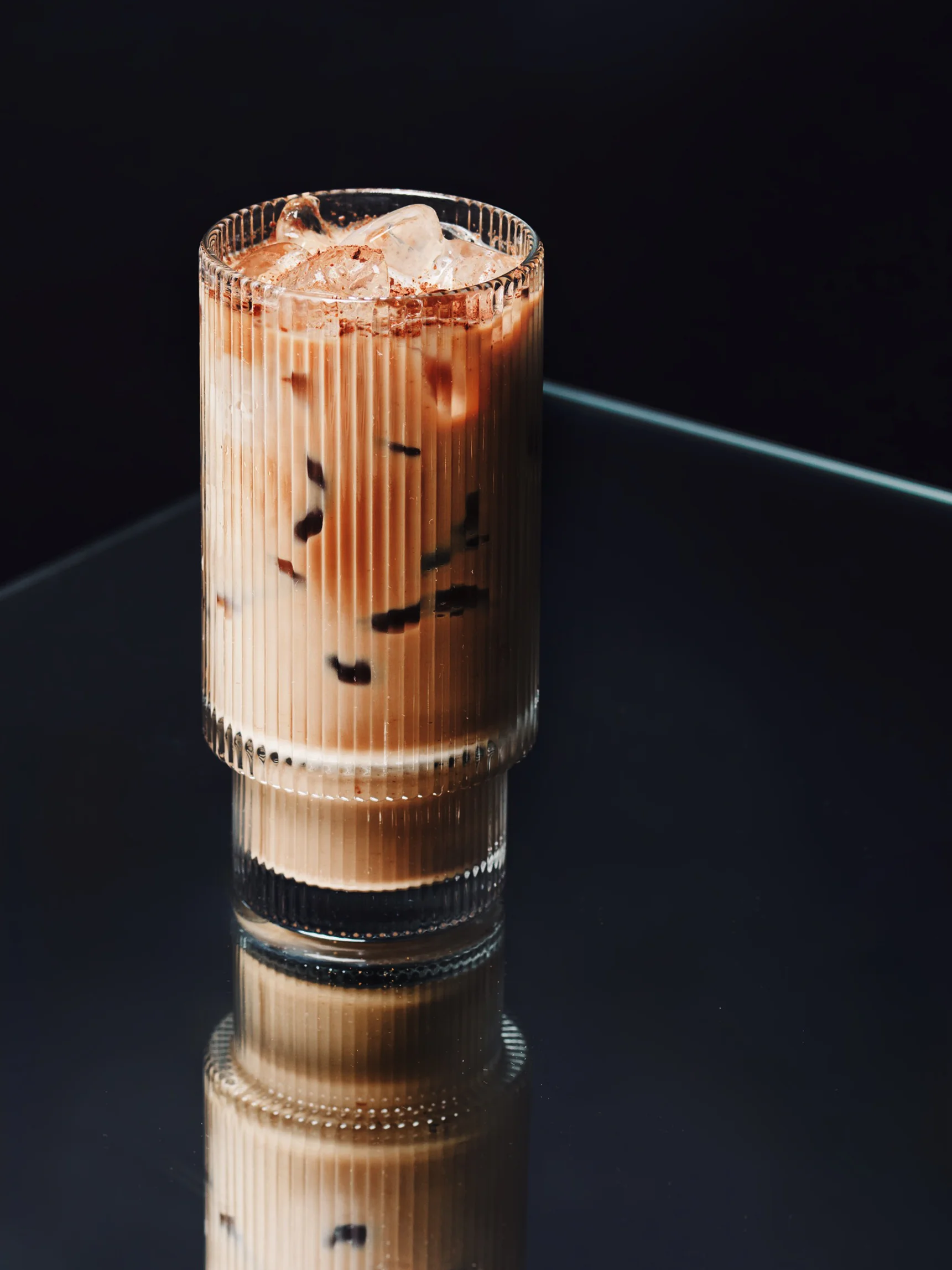 Gentle Giant: espresso with warm cardamom and sweet white chocolate, served iced in a ribbed glass