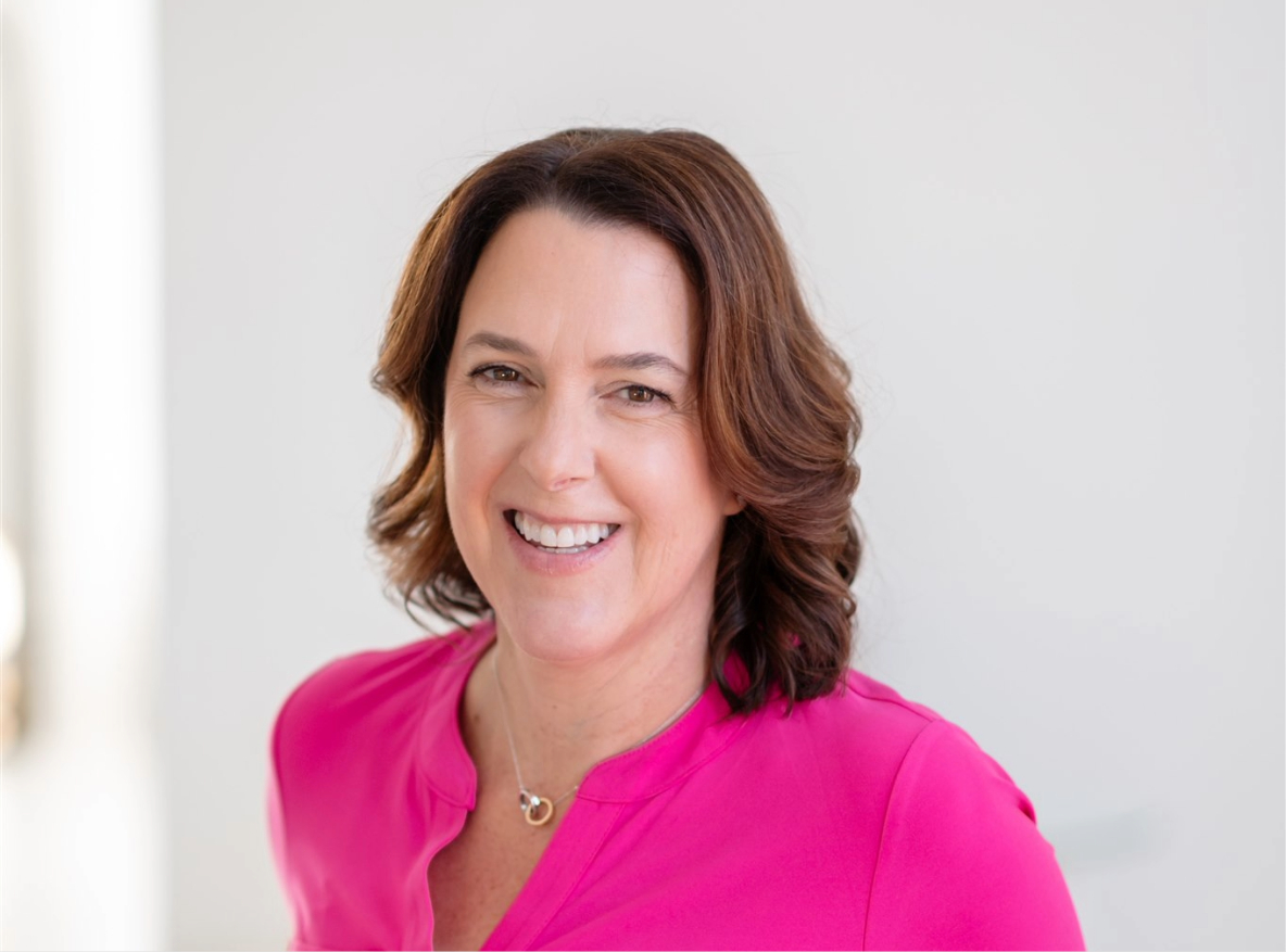 Wellness partner headshot of smiling dietitian professional.