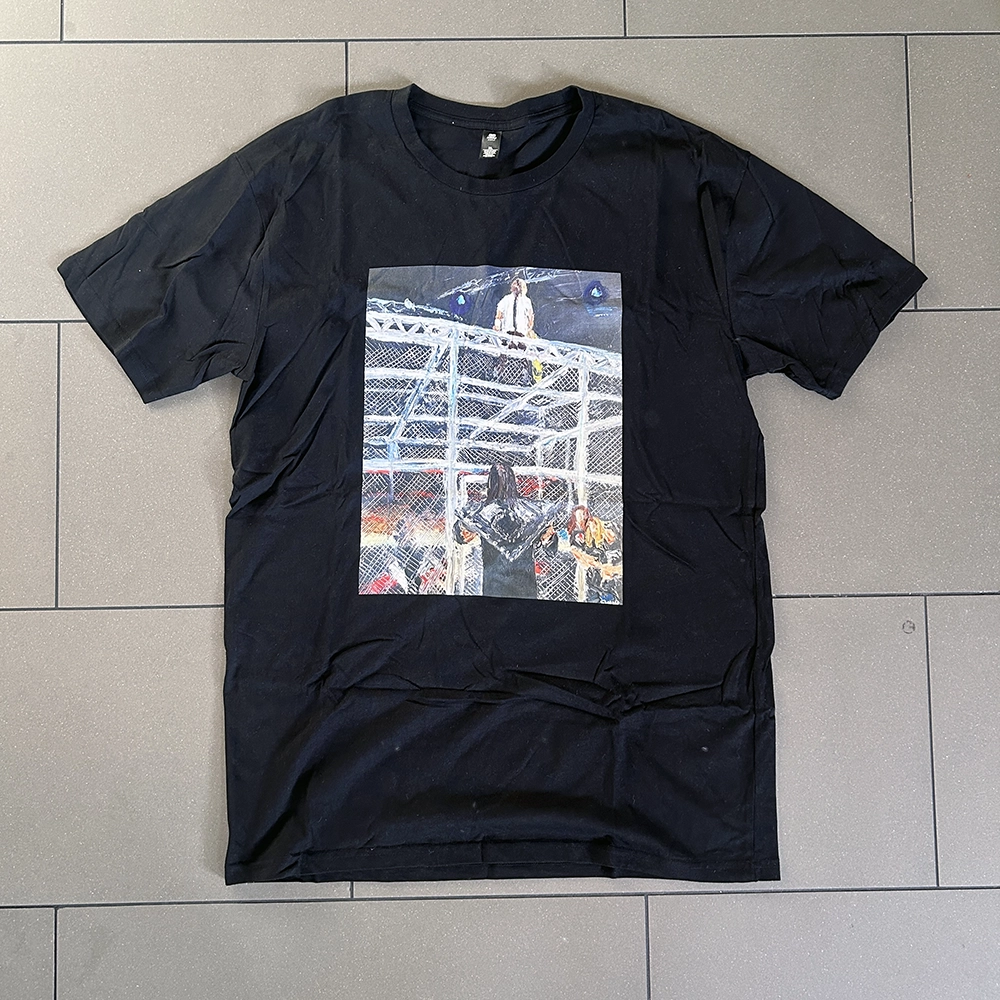 Tee featuring painting-style wrestling artwork.