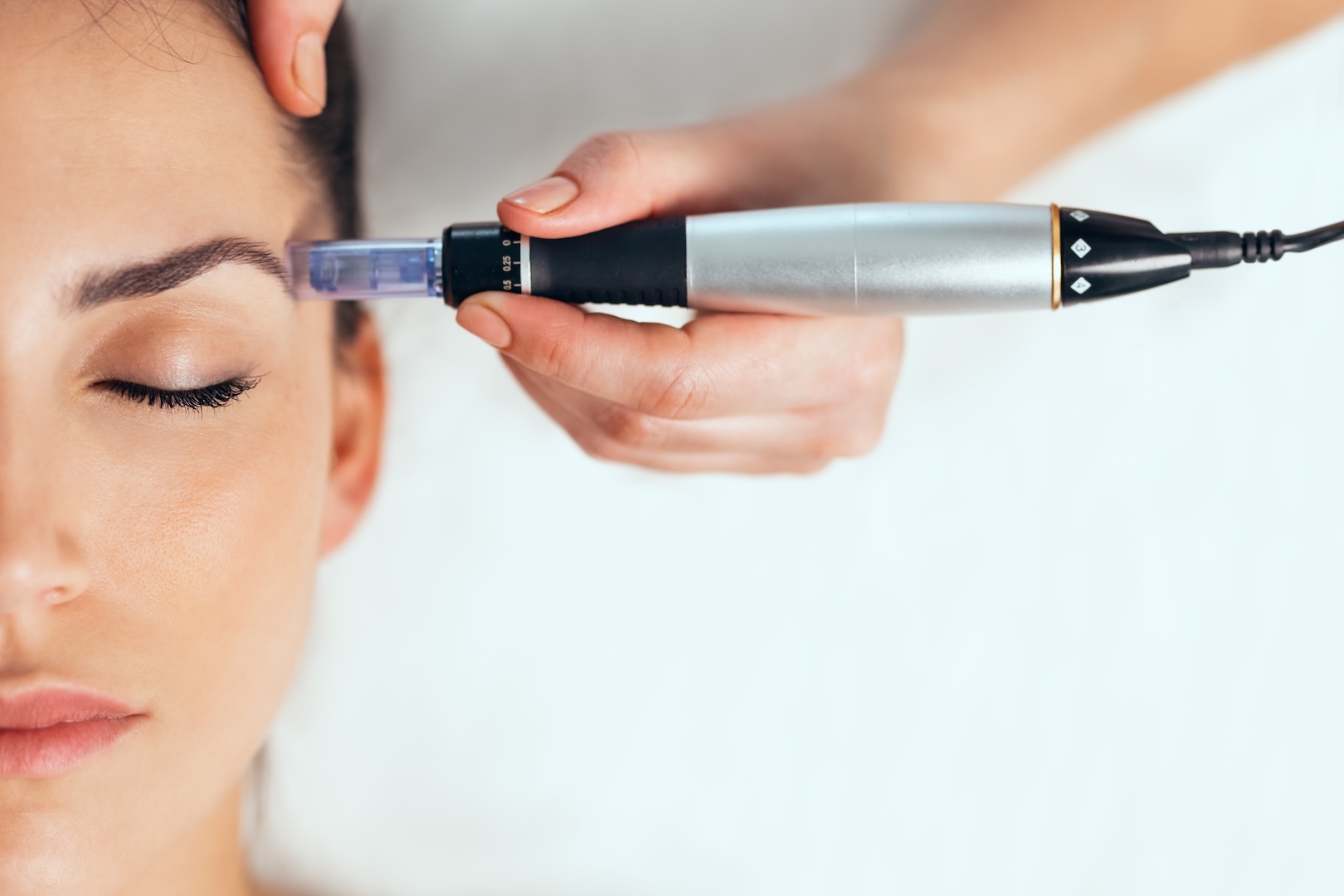 pin device on woman's face
