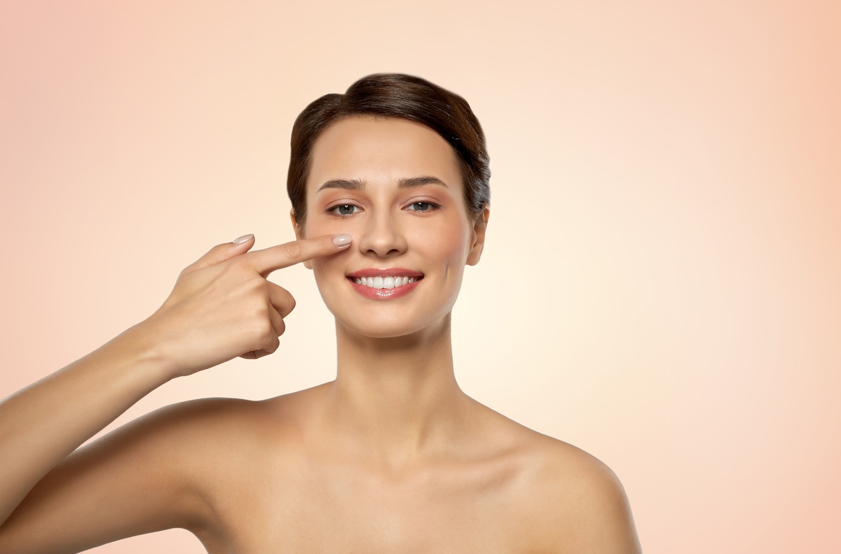 woman touching nose
