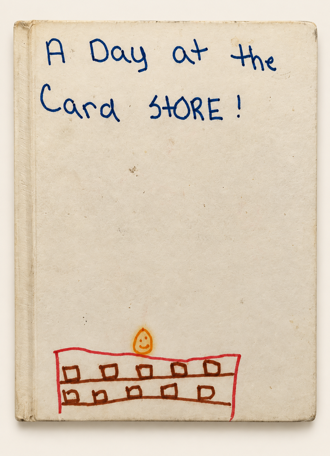 The childhood book A Day at the Card Store, with its handwritten cover