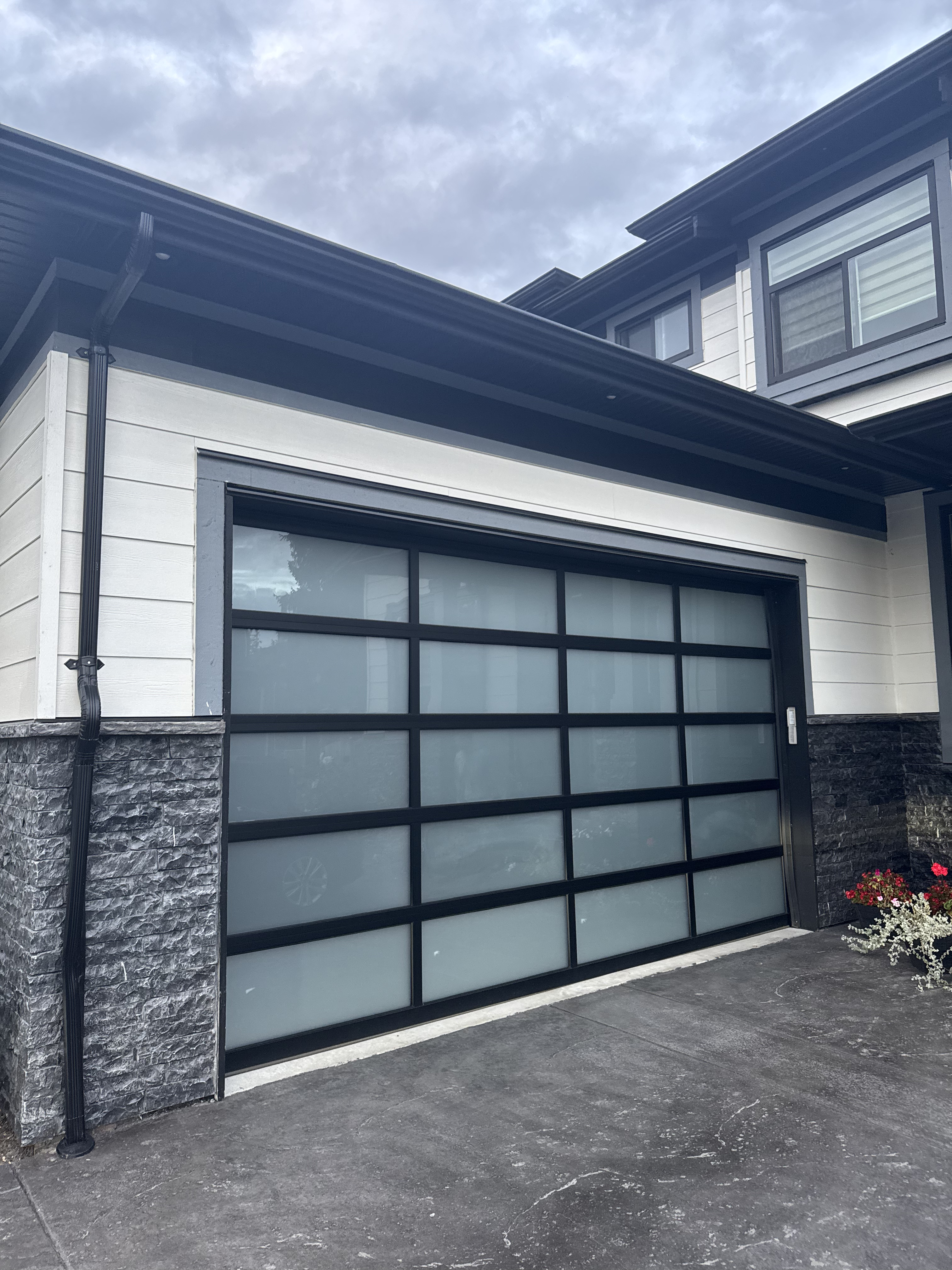 Photo of full view glass garage door with frosted windows