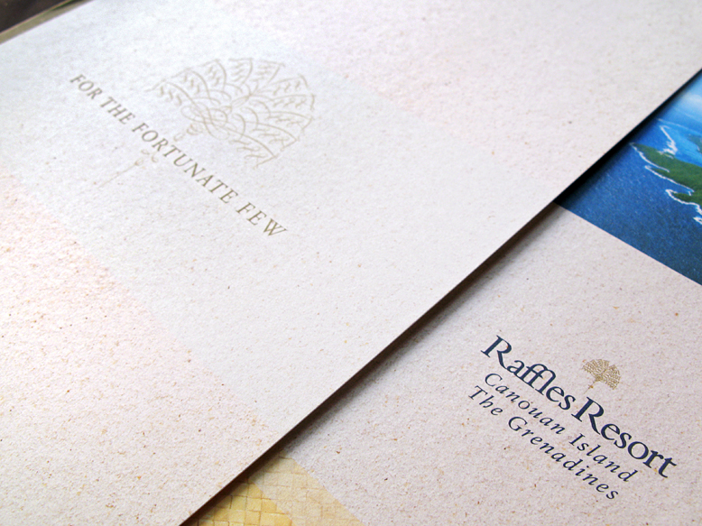 Raffles Resort Canuan Island press folder printed with textures of sand, water and thatched mat