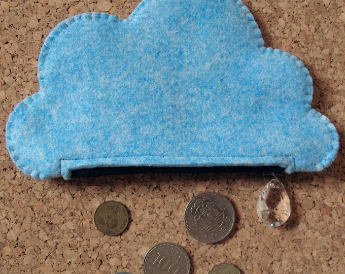 Coin purse in the shape of a cloud, stitched with silver thread, zipper opening with "raindrop" zipper pull