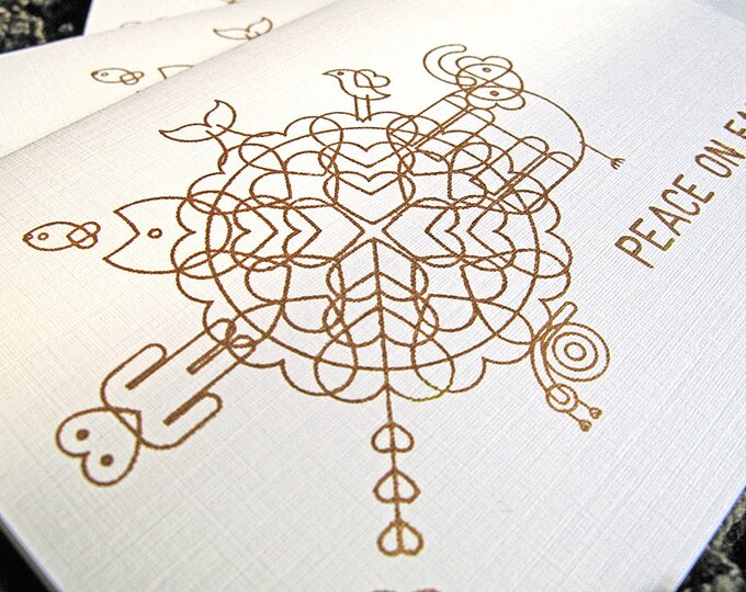 Riso print in gold ink of a globe and its inhabitants made up of hearts, "Peace on earth."