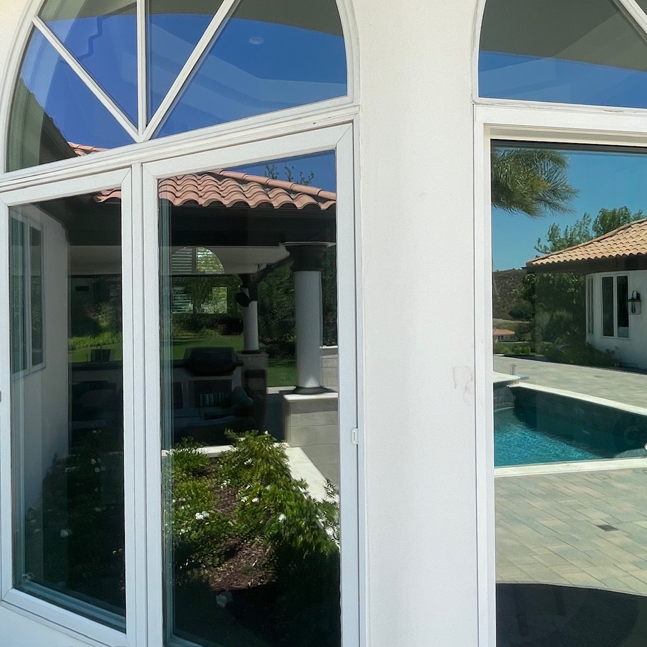 Reflections from a sparkling cleaned residential window.