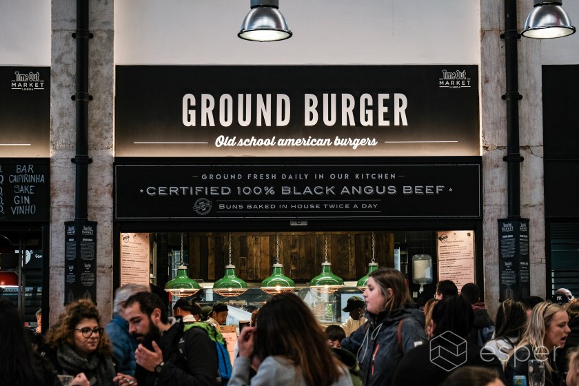 People eating at a hamburger restaurant