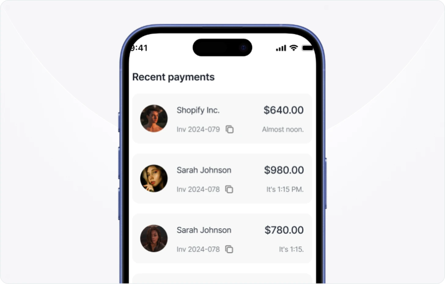 A cell phone with a credit card on the screen.