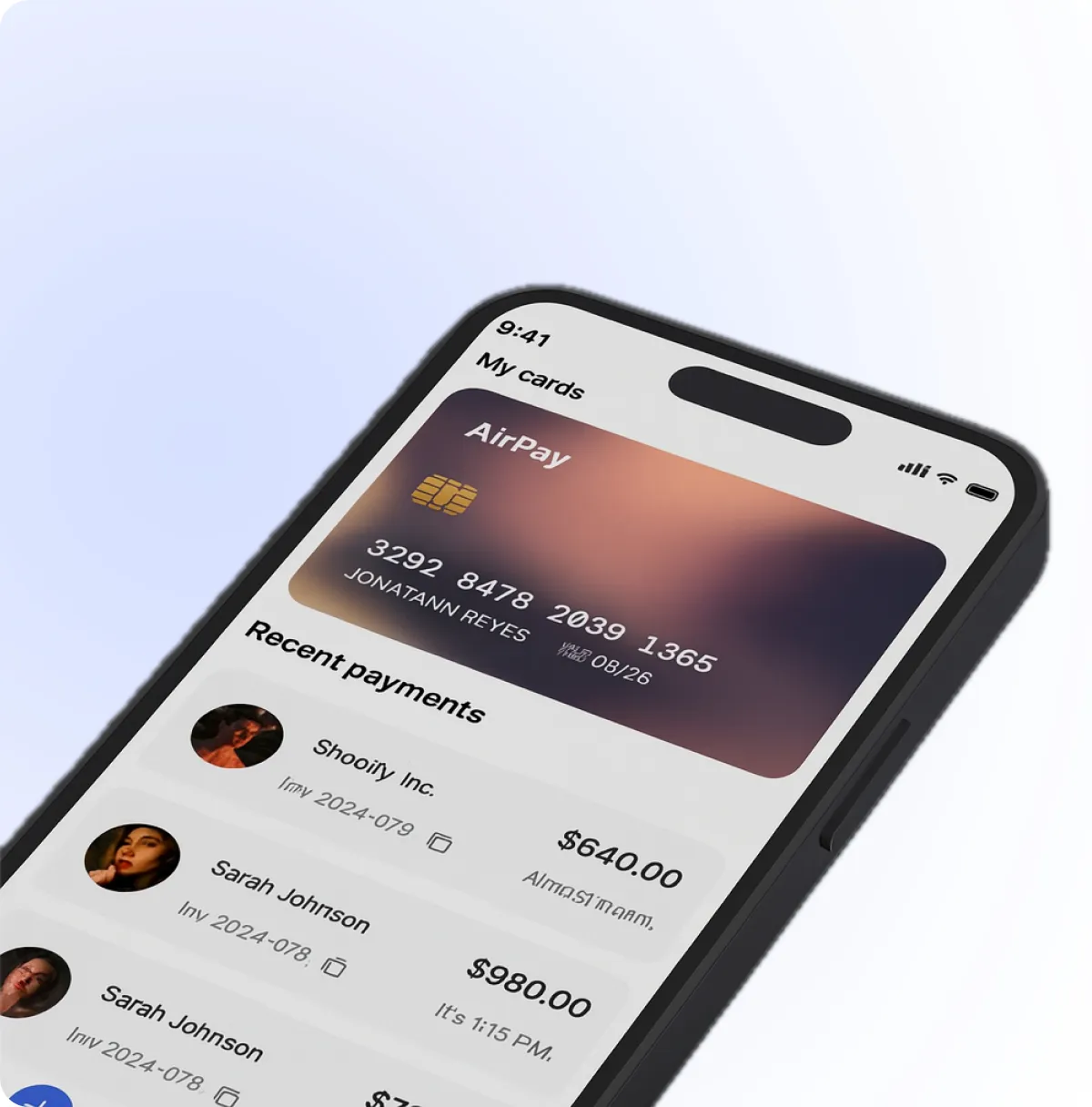 A phone with a credit card on the screen.