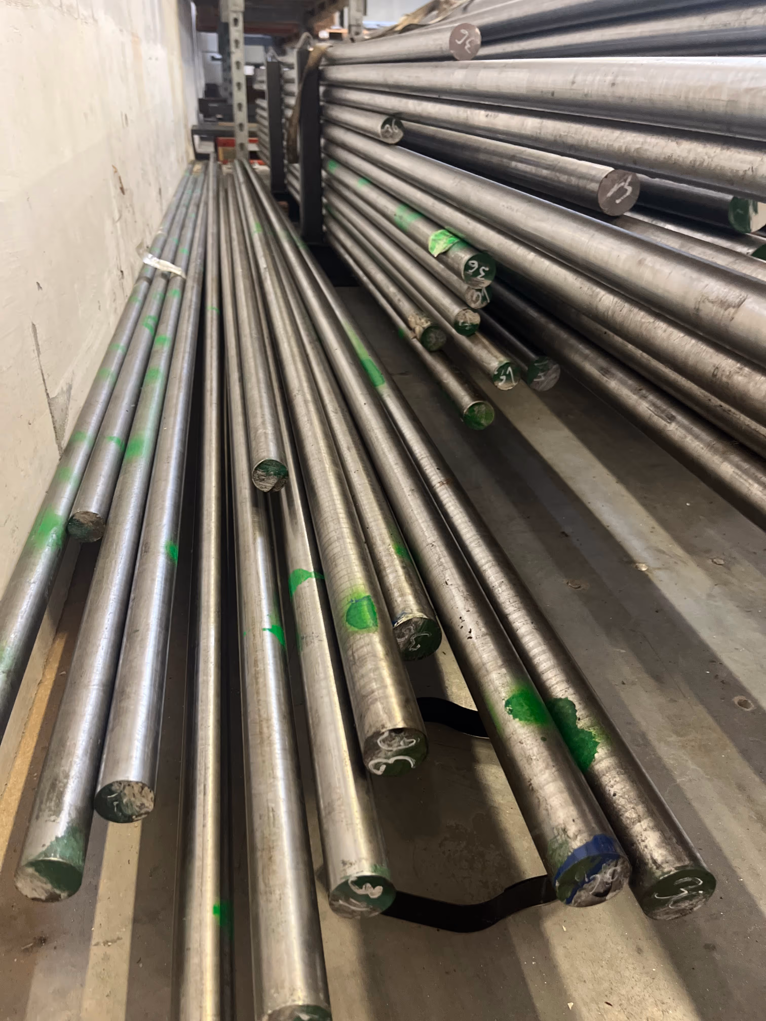 Tool steel rods on racks
