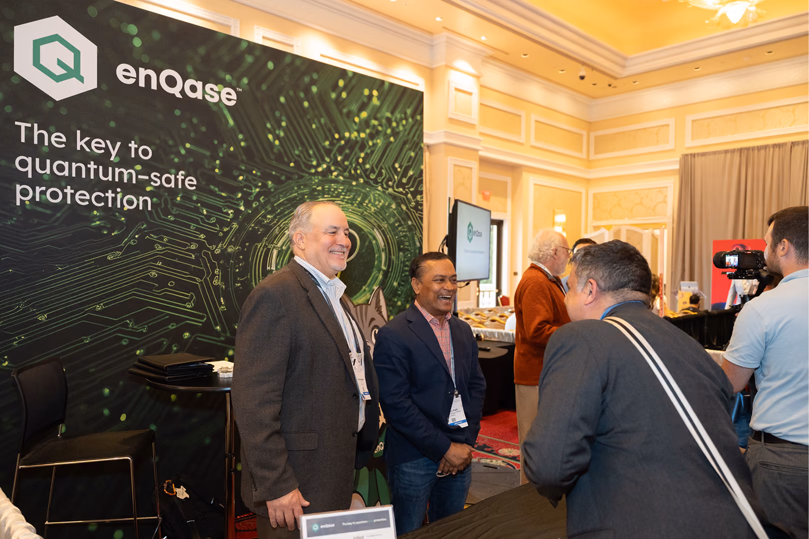 Visitors at the enQase stand