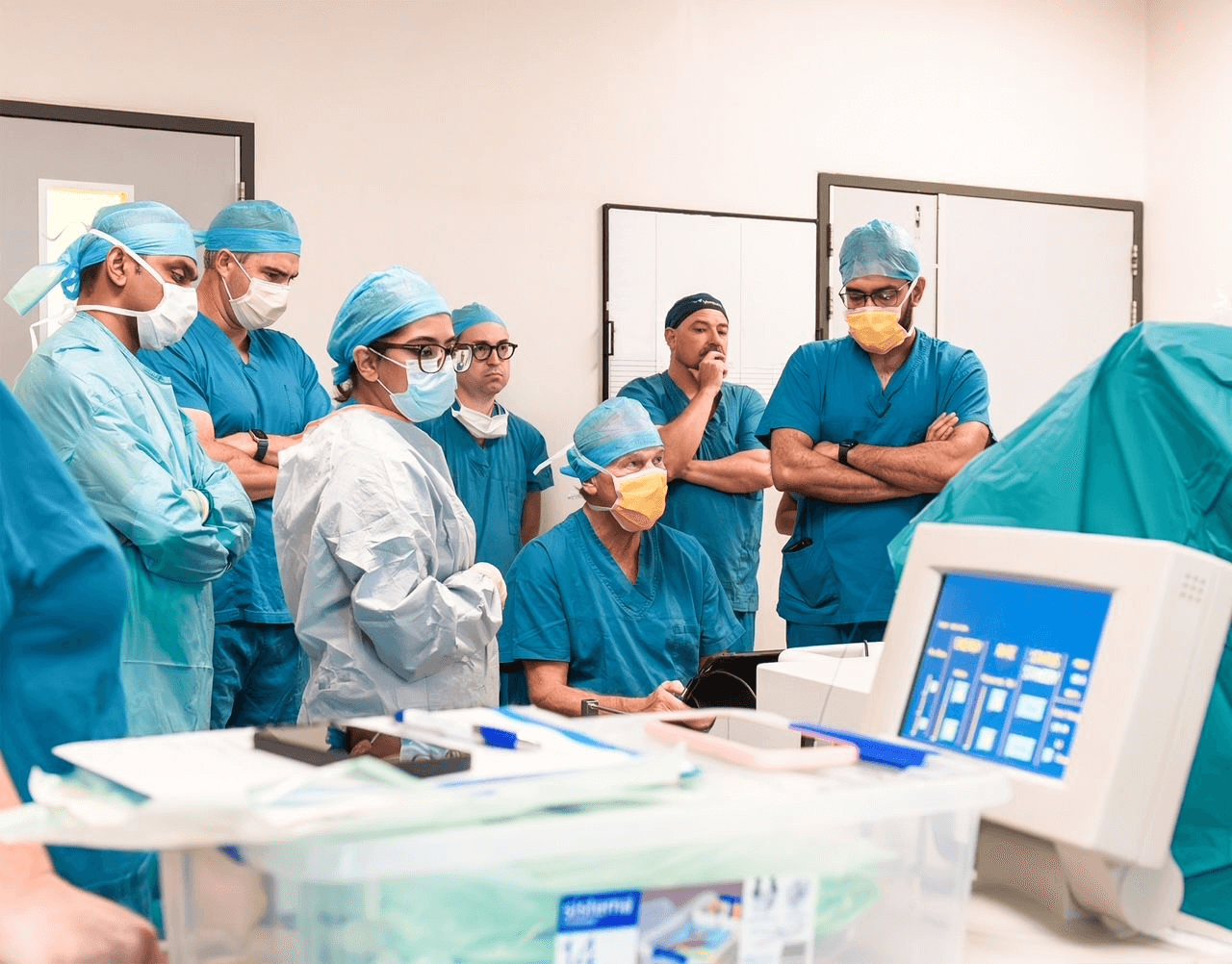 Surgical team performing the first robotic-assisted HoLEP procedure using Andromeda Surgical system during a clinical trial.