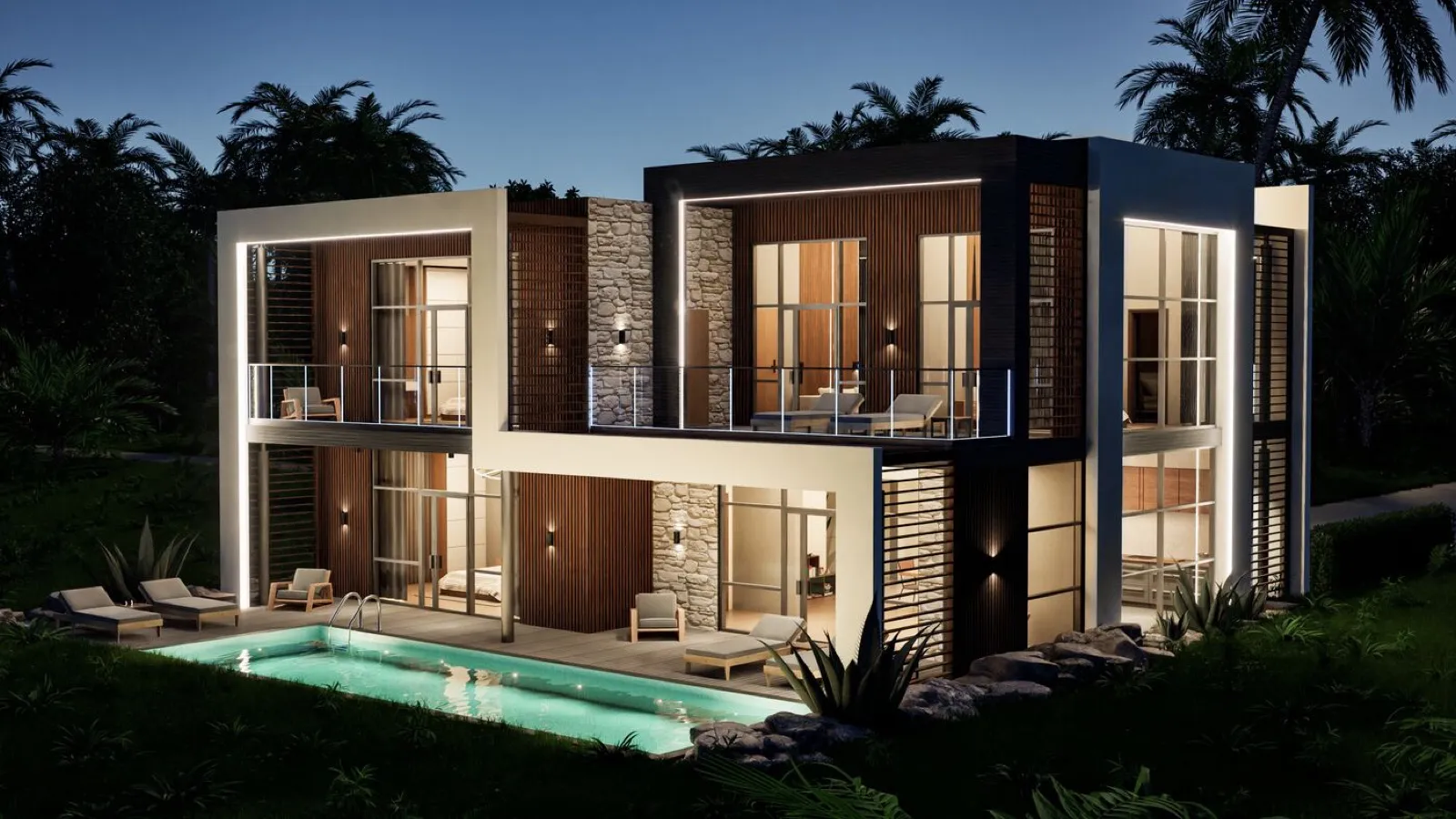 Villa 2.1 pool-side view at dusk with interiors lit