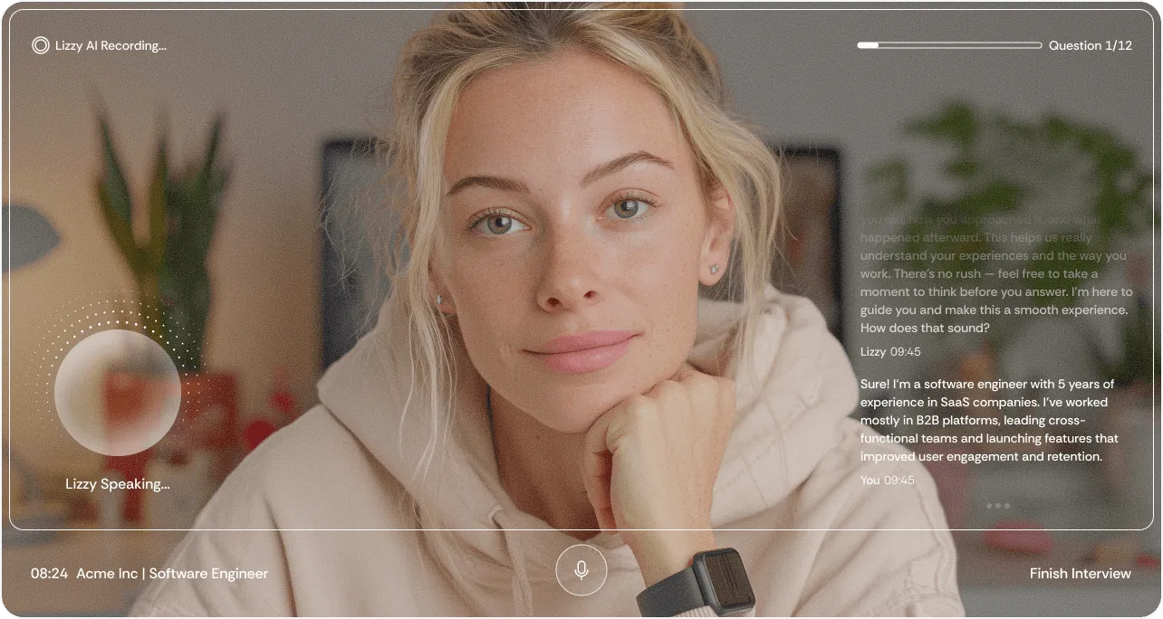 Close-up of a blonde woman in a beige hoodie speaking during a video interview with visible transcript text and progress bar.