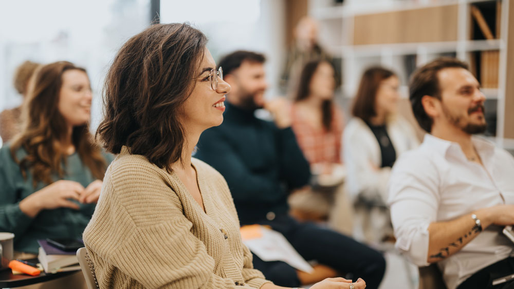 Woman engaging in a presentation.
