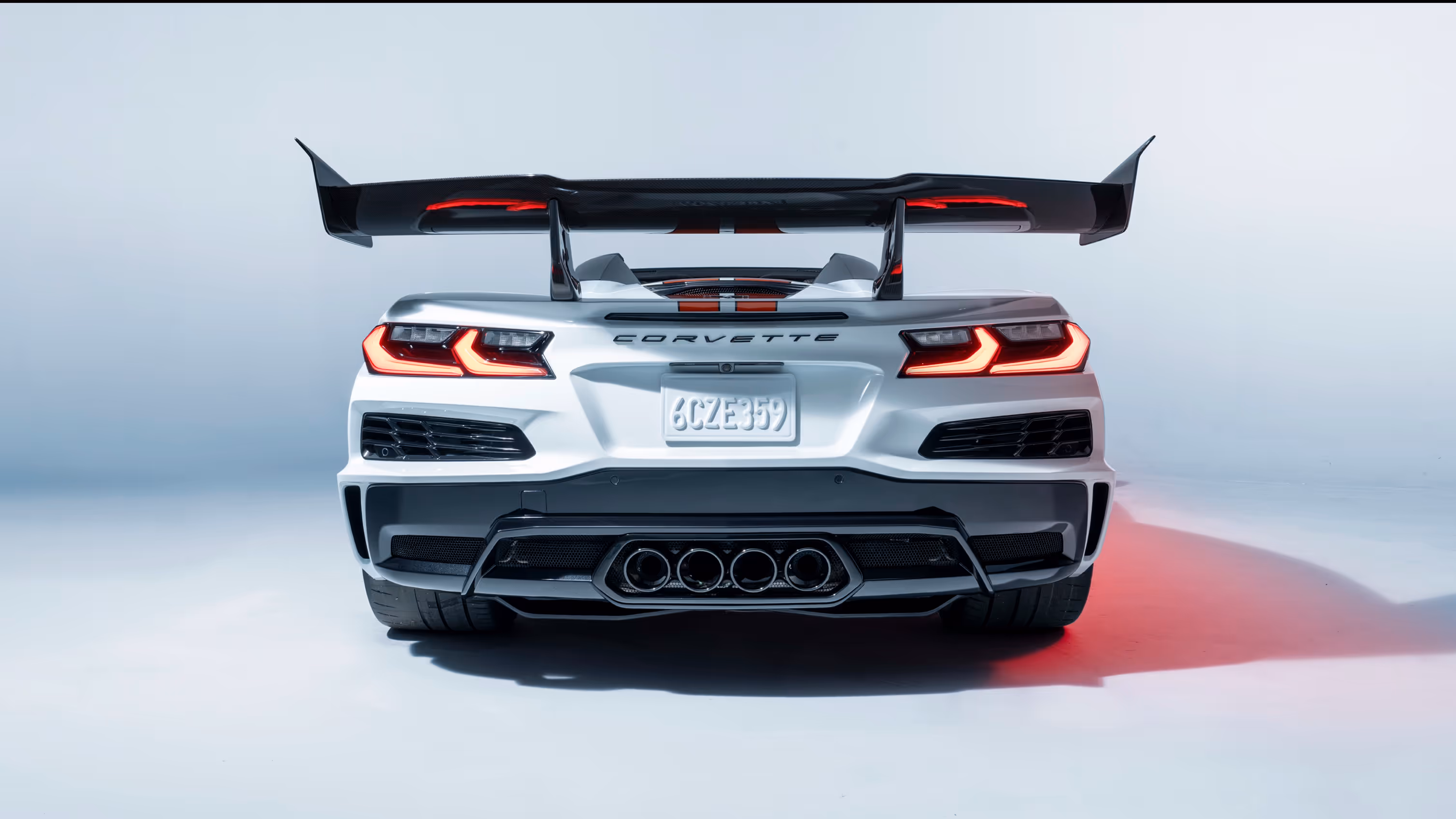 Rear view of the Corvette ZR1 emphasizing taillights, quad exhaust, and rear diffuser design.