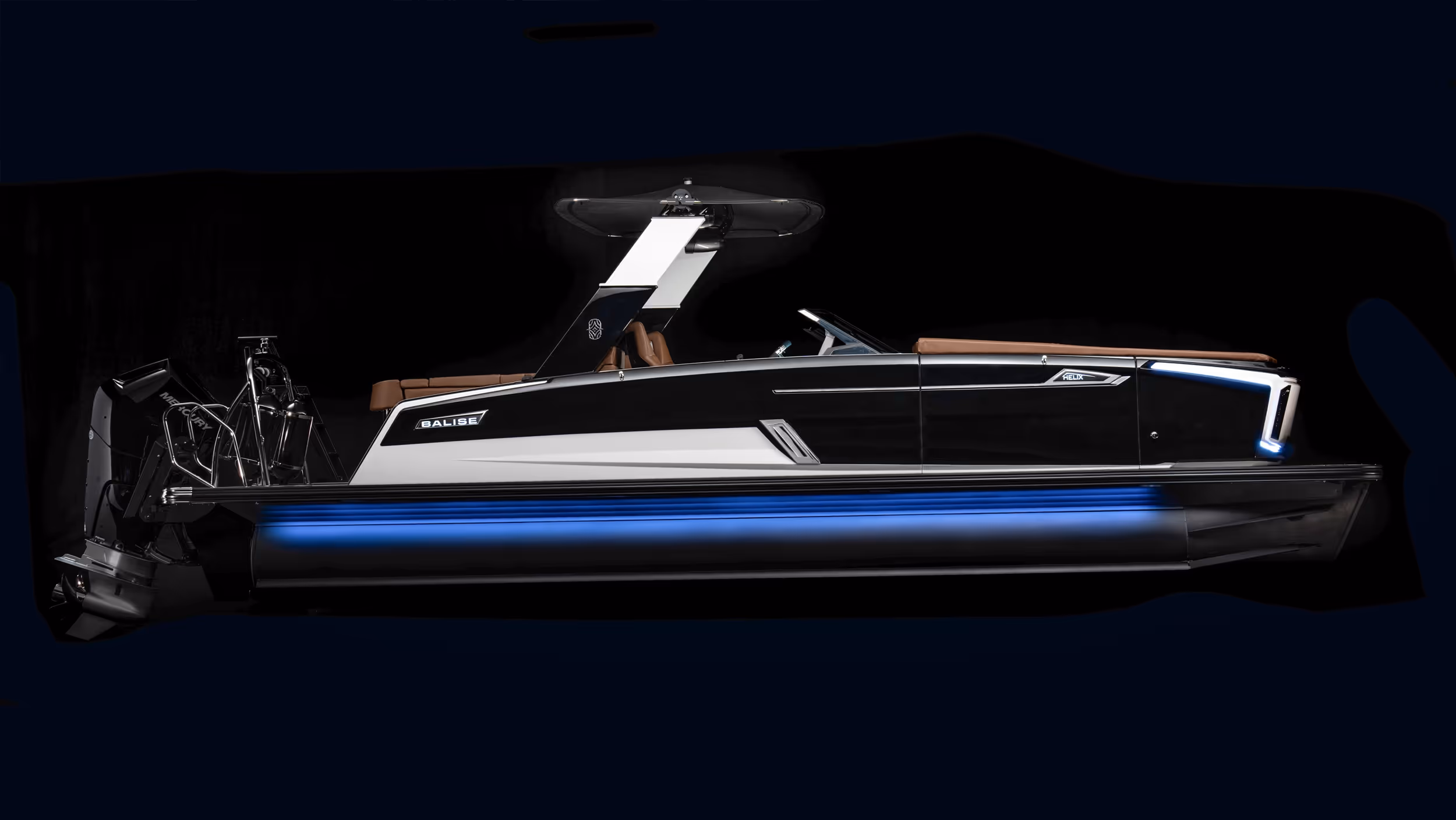 Profile view of Helix 26C illuminated with accent lighting showing hull shape and side trim.