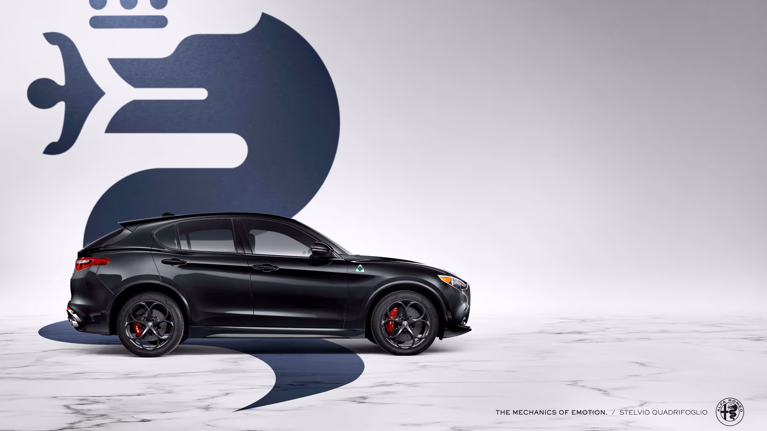 Side profile of black Alfa Romeo Stelvio SUV with navy serpent motif projected behind.