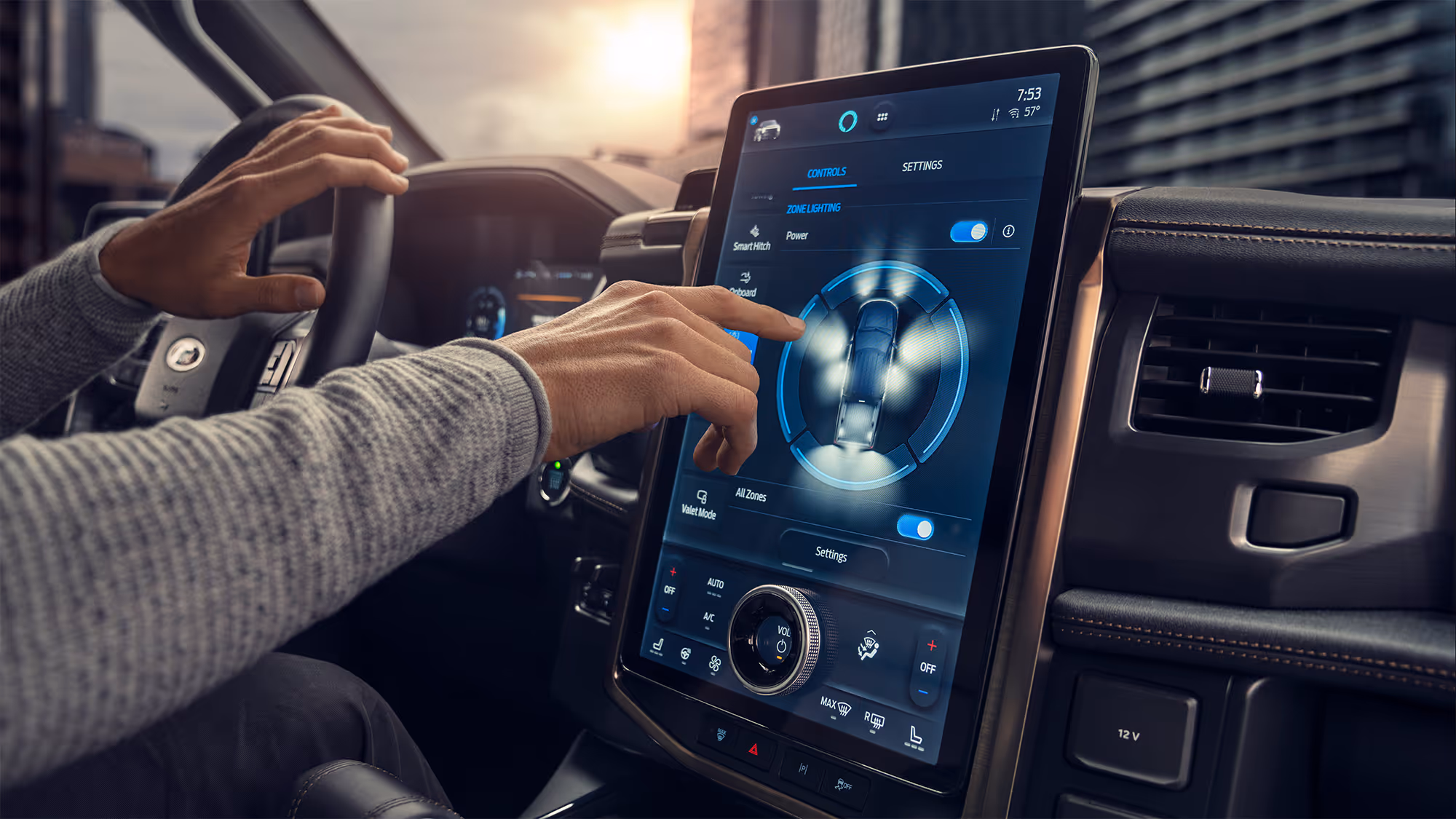 Close-up of hands adjusting settings on the Ford F-150 Lightning touchscreen, dashboard bathed in warm afternoon light.