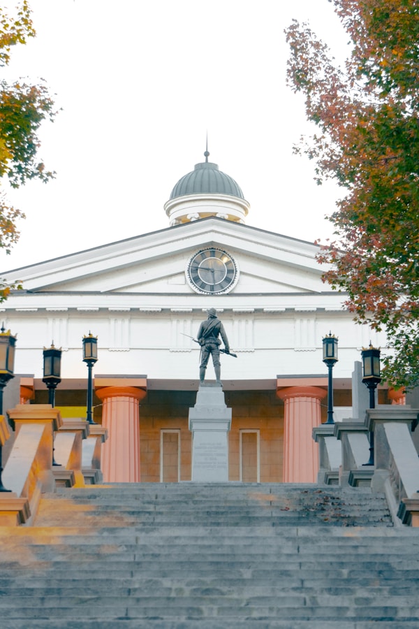 a statue of a man on top of a building