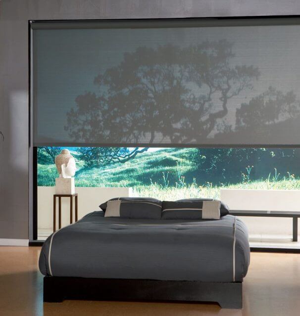 blackout motorized interior shades in a bedroom in Florida