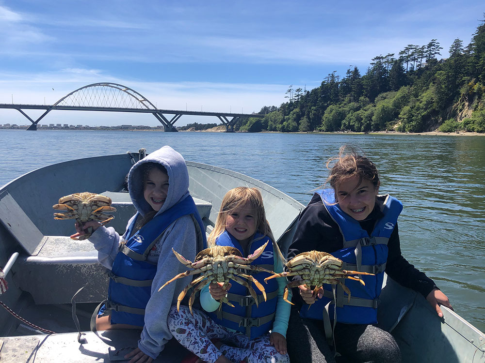 Girls on boat, crabbing